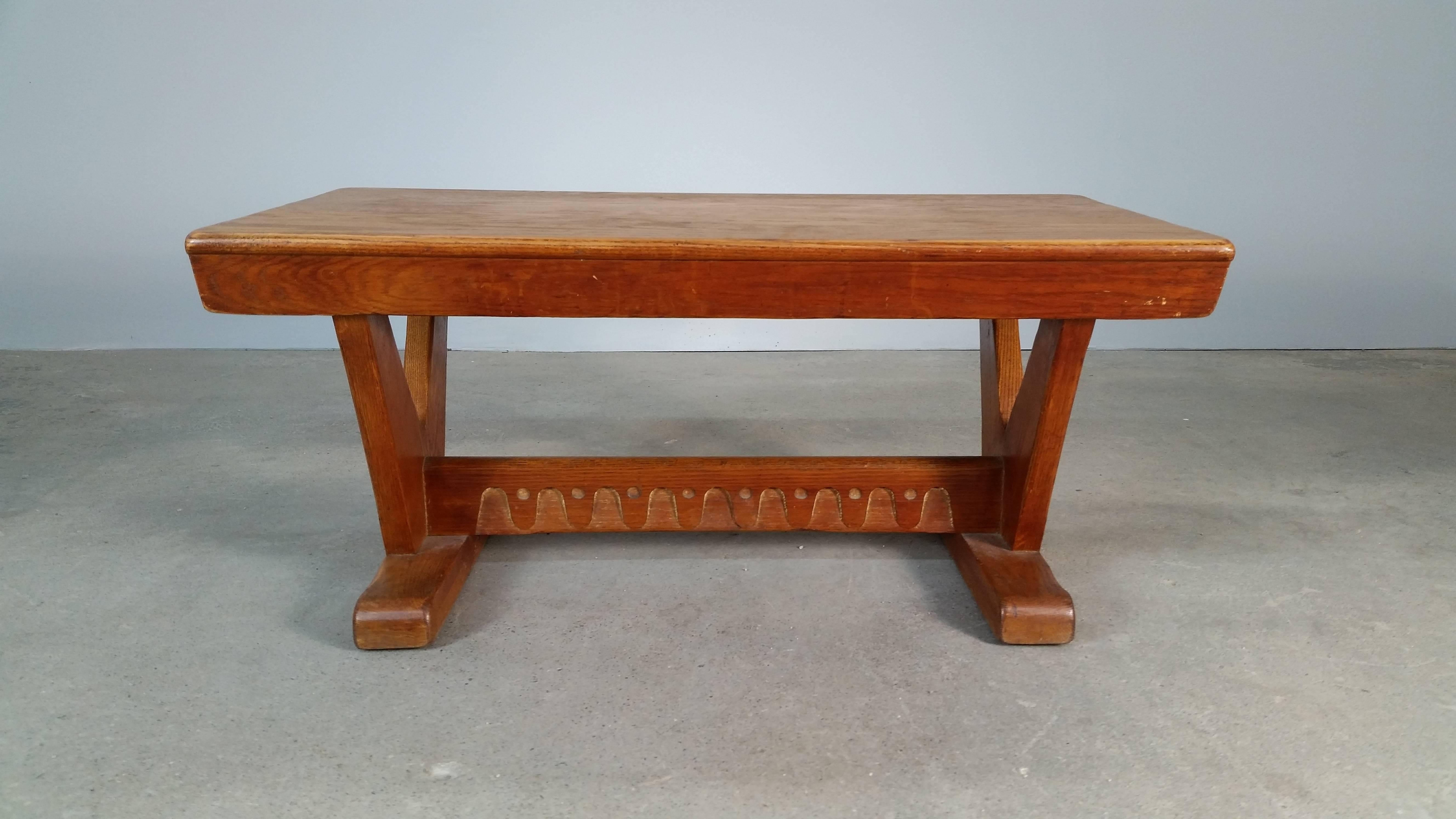 Modernist coffee table in white oak, circa 1954. Although we've been unable to document this piece, we feel very strongly that it's French, or quite possibly Swiss. Incredibly well made piece, as shown by the pegged joinery where the side elements