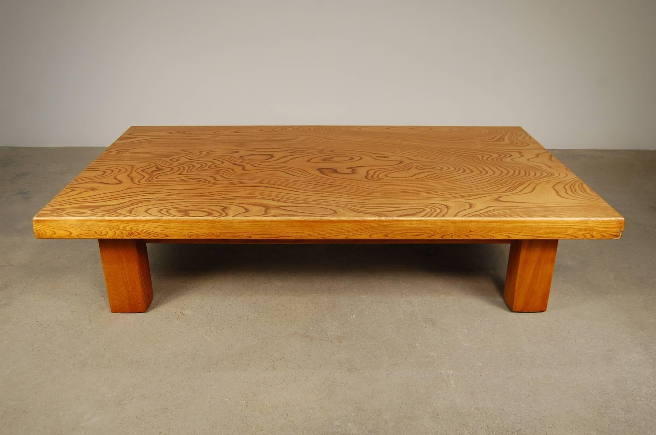 Japanese low table in Japanese elm. The figuring on the top is absolutely amazing, and the finish has a beautiful, slightly honey or amber coloration. The last image is to explain the shape of the legs, as they aren't entirely square. I think the