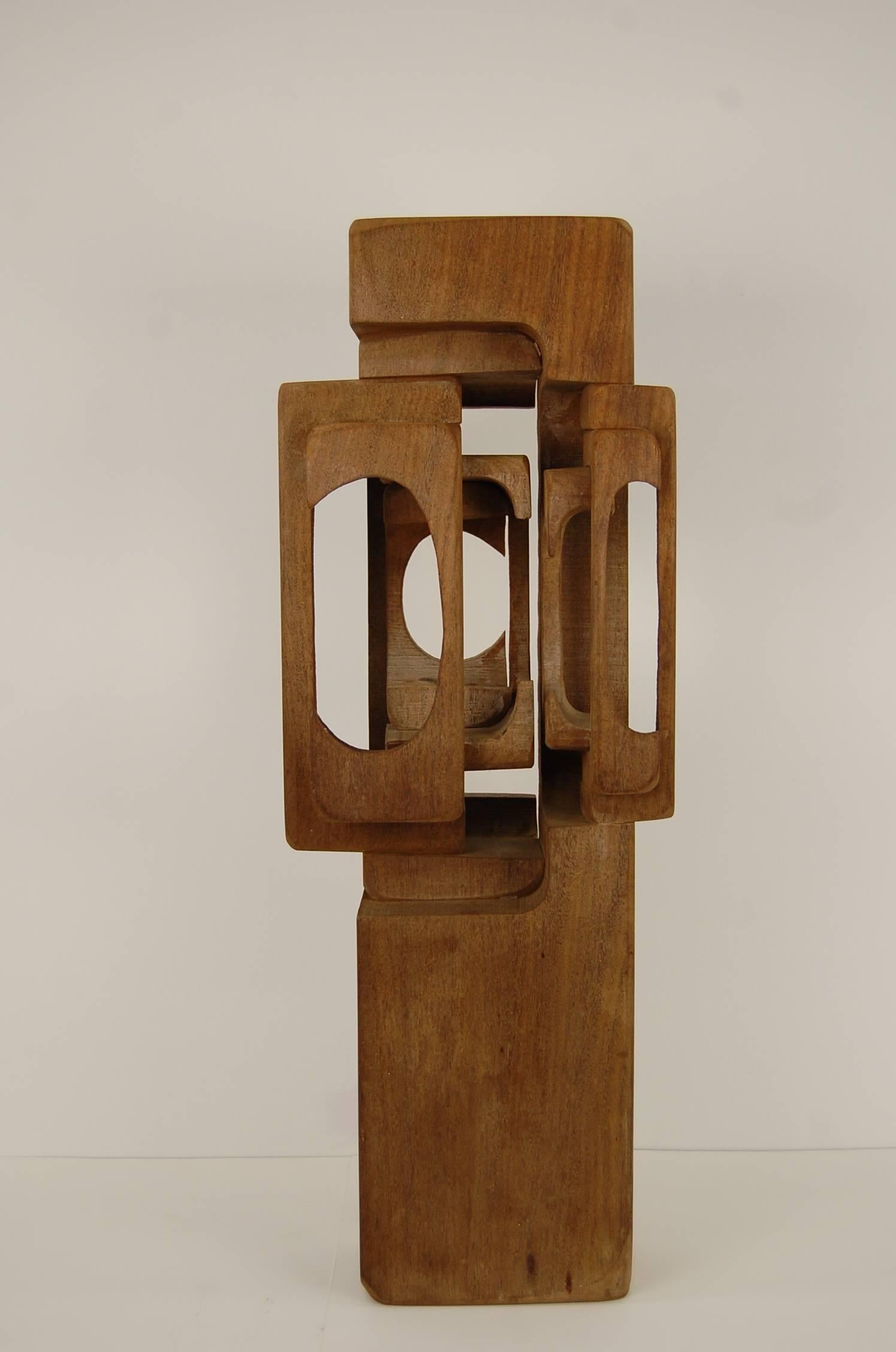 Abstract sculpture in solid teak, by British artist Brian Willsher (1930-2010). Fully signed and dated 1973. This is a relatively early piece by Willsher. Measures 23 1/6