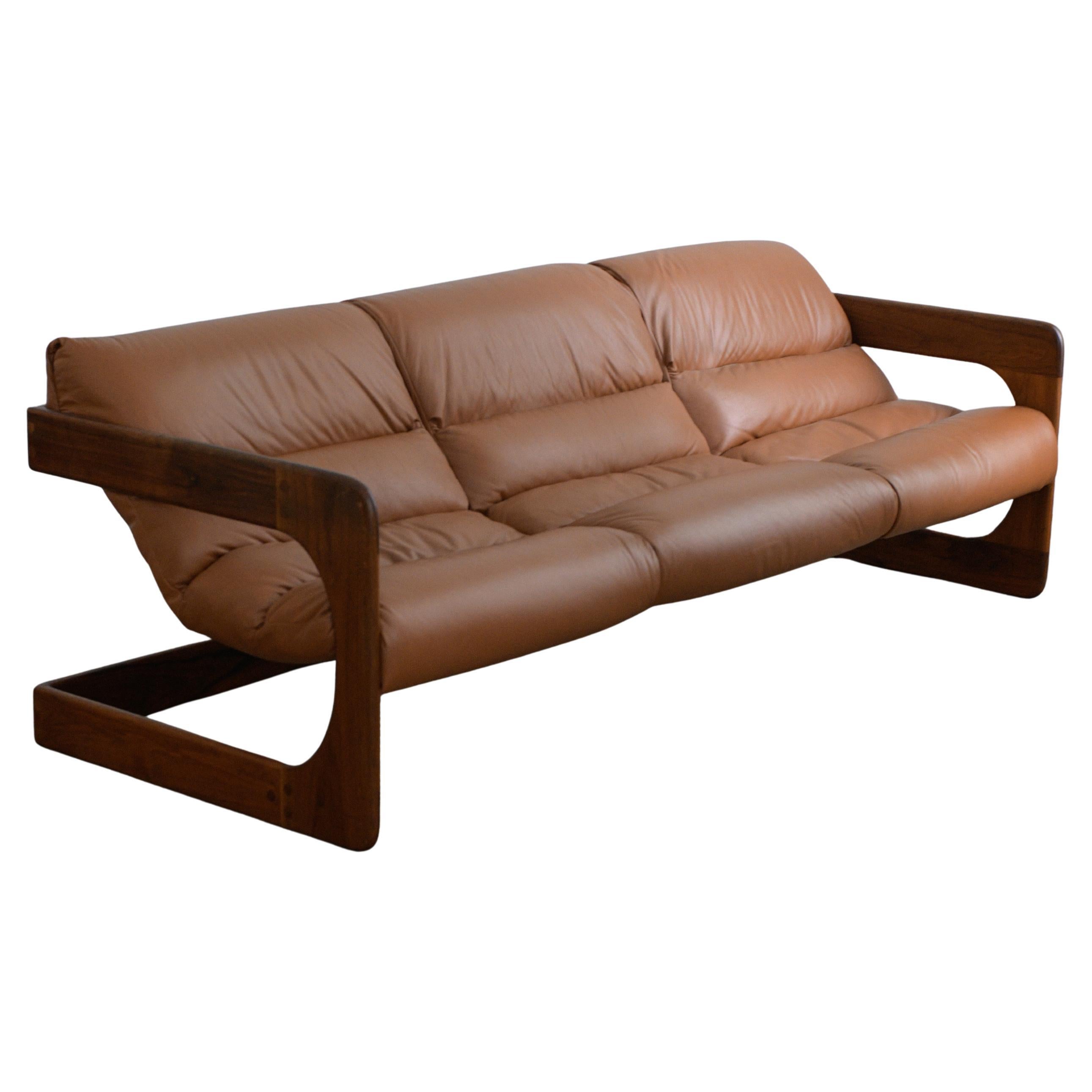 Rare 1970s Lou Hodges Three Seat Sling Sofa in burnt orange leather and oak For Sale