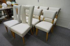 Incredibile set di dieci sedie da pranzo in pelle di Paul Laszlo, stile metà del secolo scorso.