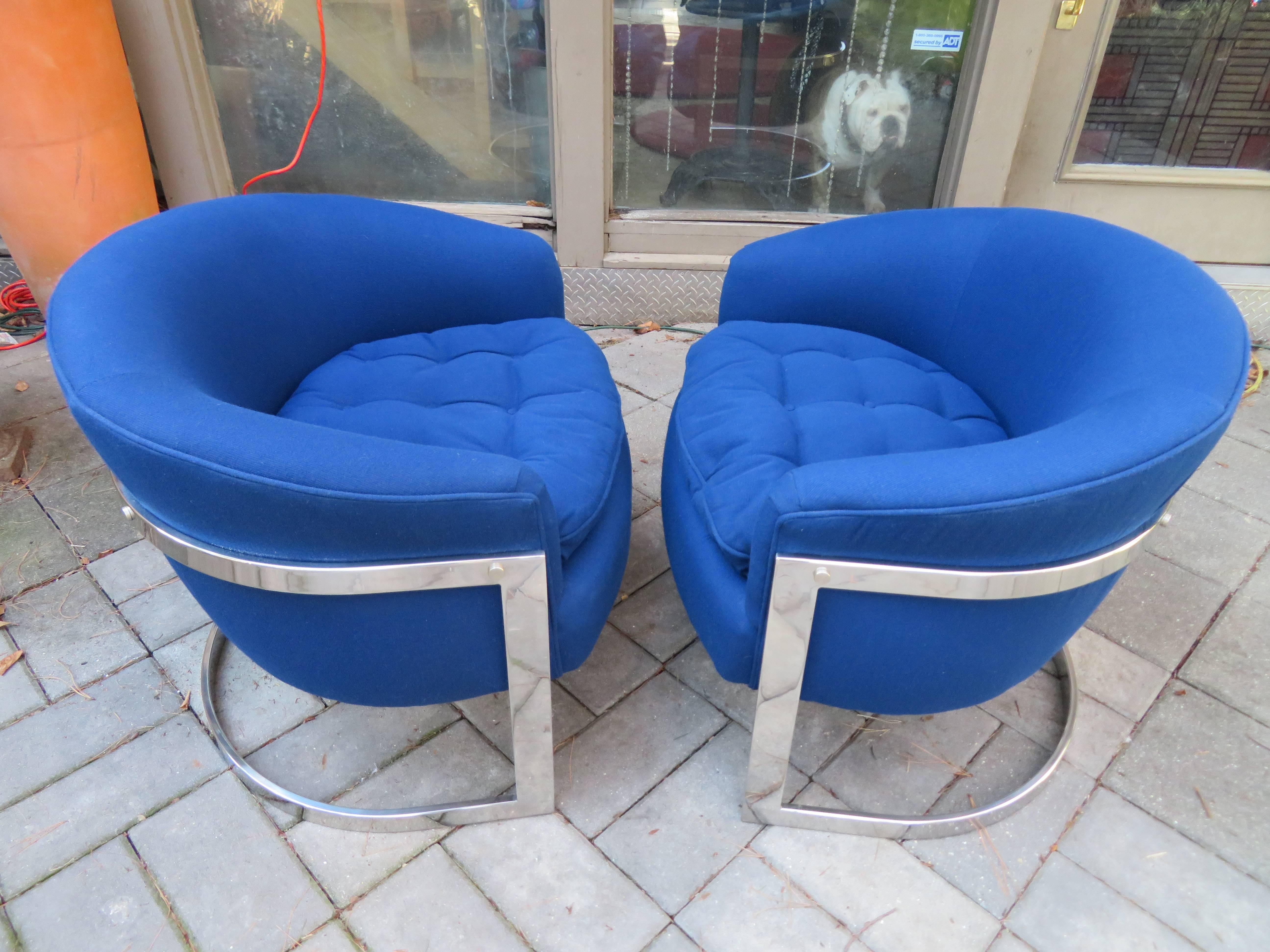 Fabulous pair of chrome cantilevered barrel back chairs. This pair is super clean and have shiny mirrored finish chrome and original upholstery in nice vintage condition. The seat is slightly wider than most like this-just fabulous!