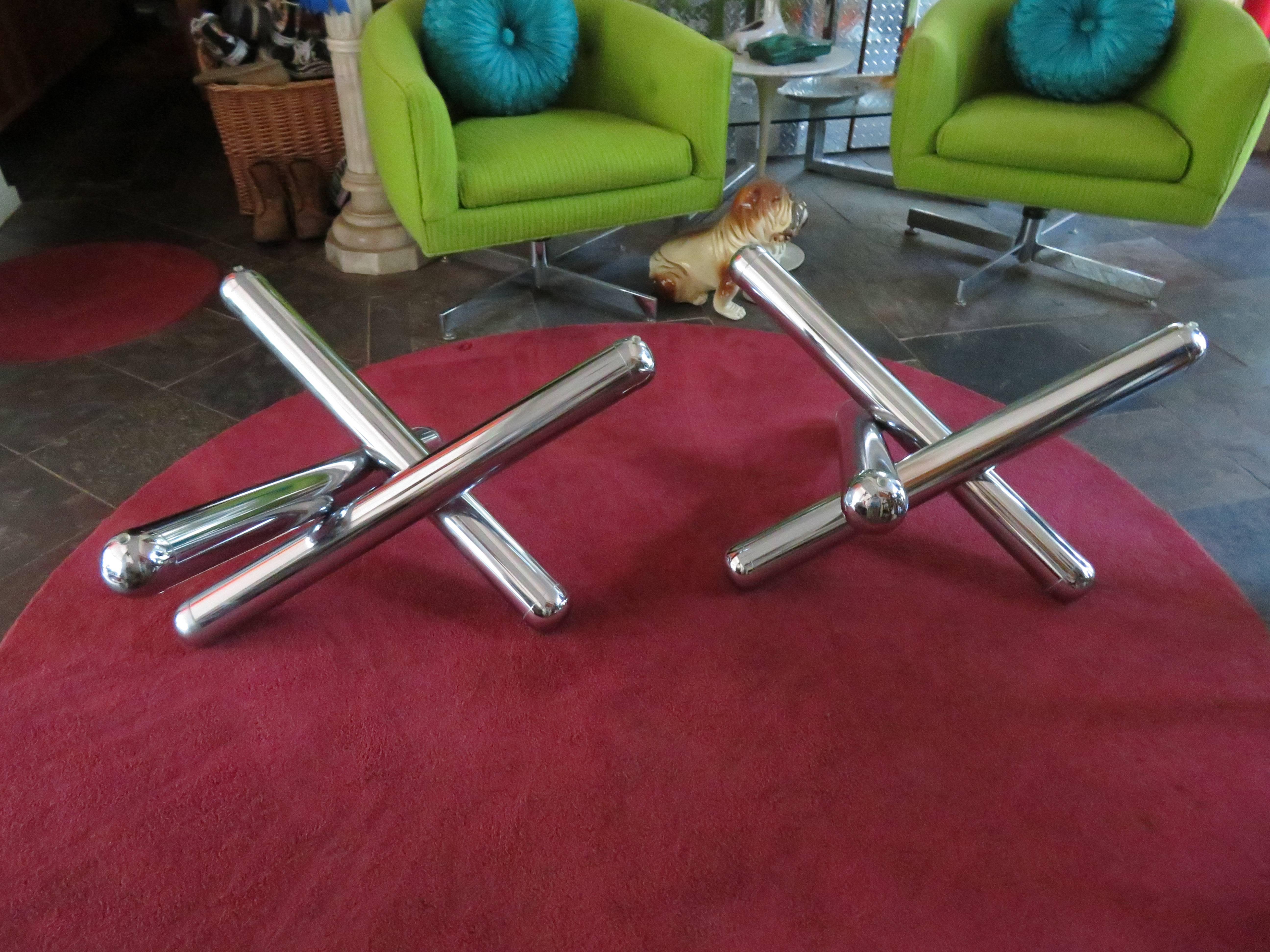 Stunning pair of chrome jax coffee tables. Use with one large glass or as two separate tables side by side you decide how to use these fantastic pop art tables. Each table base is 15" T x 29" W x 29" D.