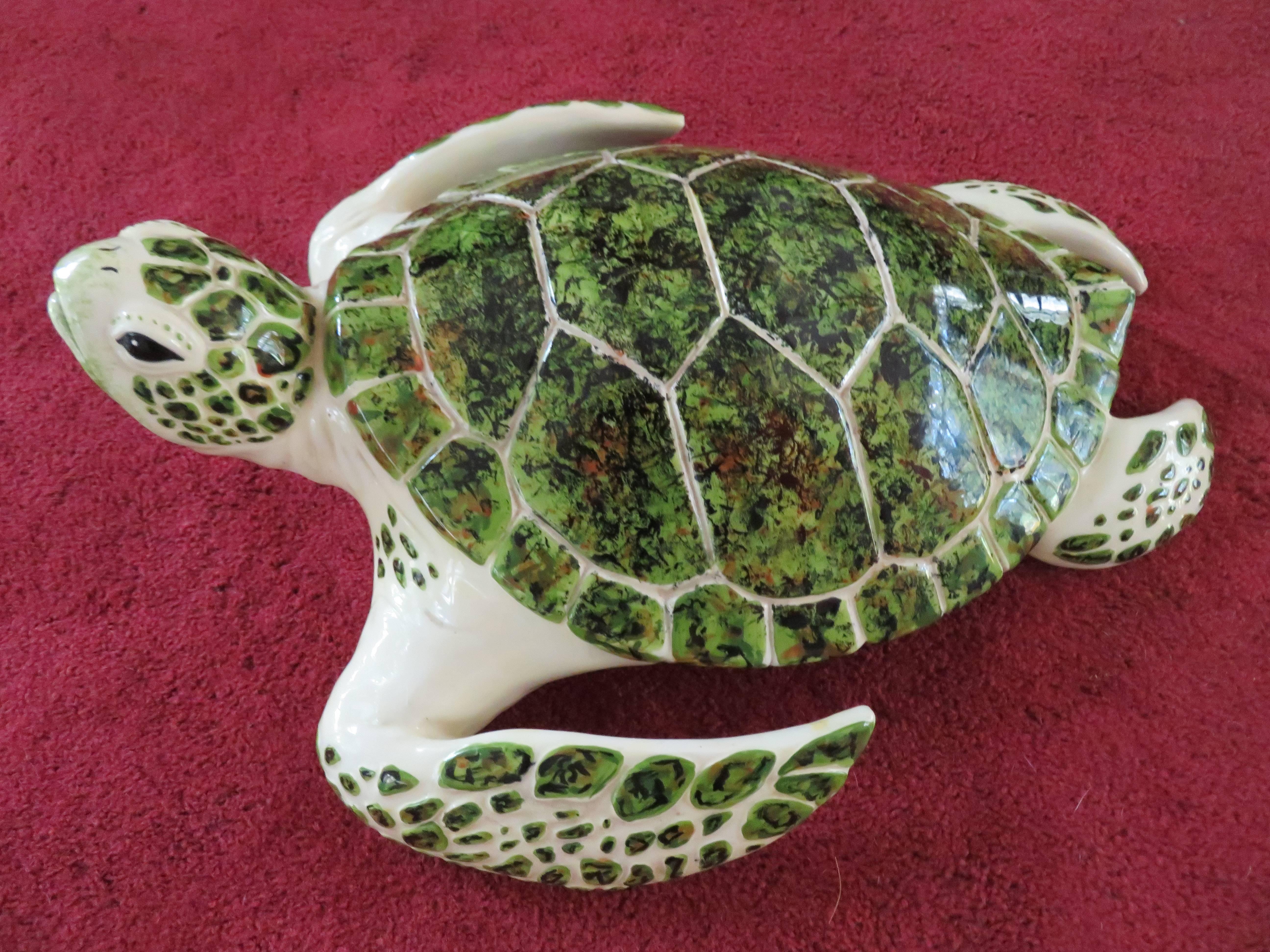 Whimsical large-scale ceramic sea turtle. Everybody needs a giant sea turtle especially if you live near the sea shore!