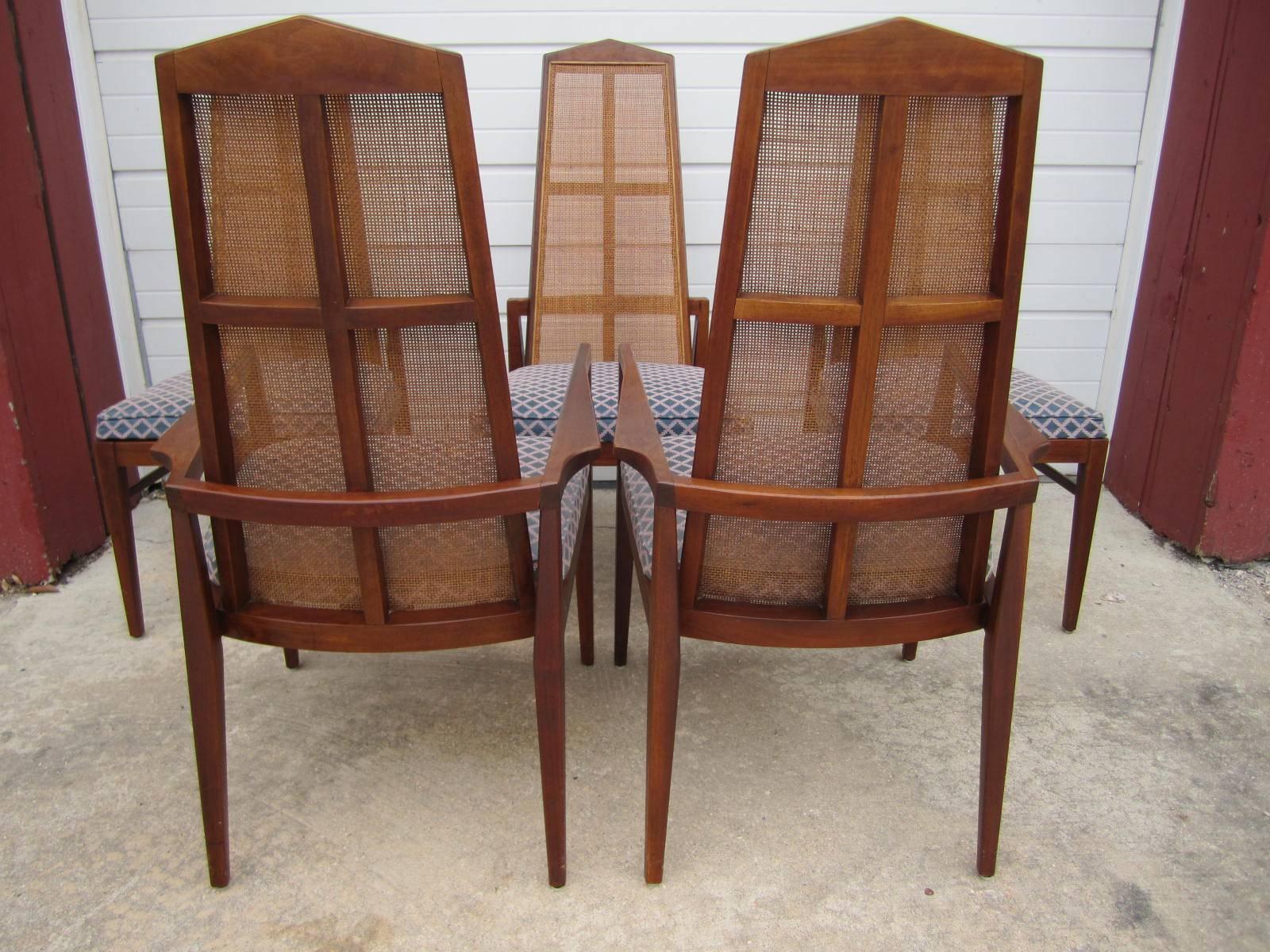 Mid Century Modern Walnut Dining Set by Foster McDavid. Founded in 1950 in Tampa, Florida- Foster McDavid's designs exude the stylings of the mad men era. These chairs look great with their original Probber style octagon dining table.  We love the