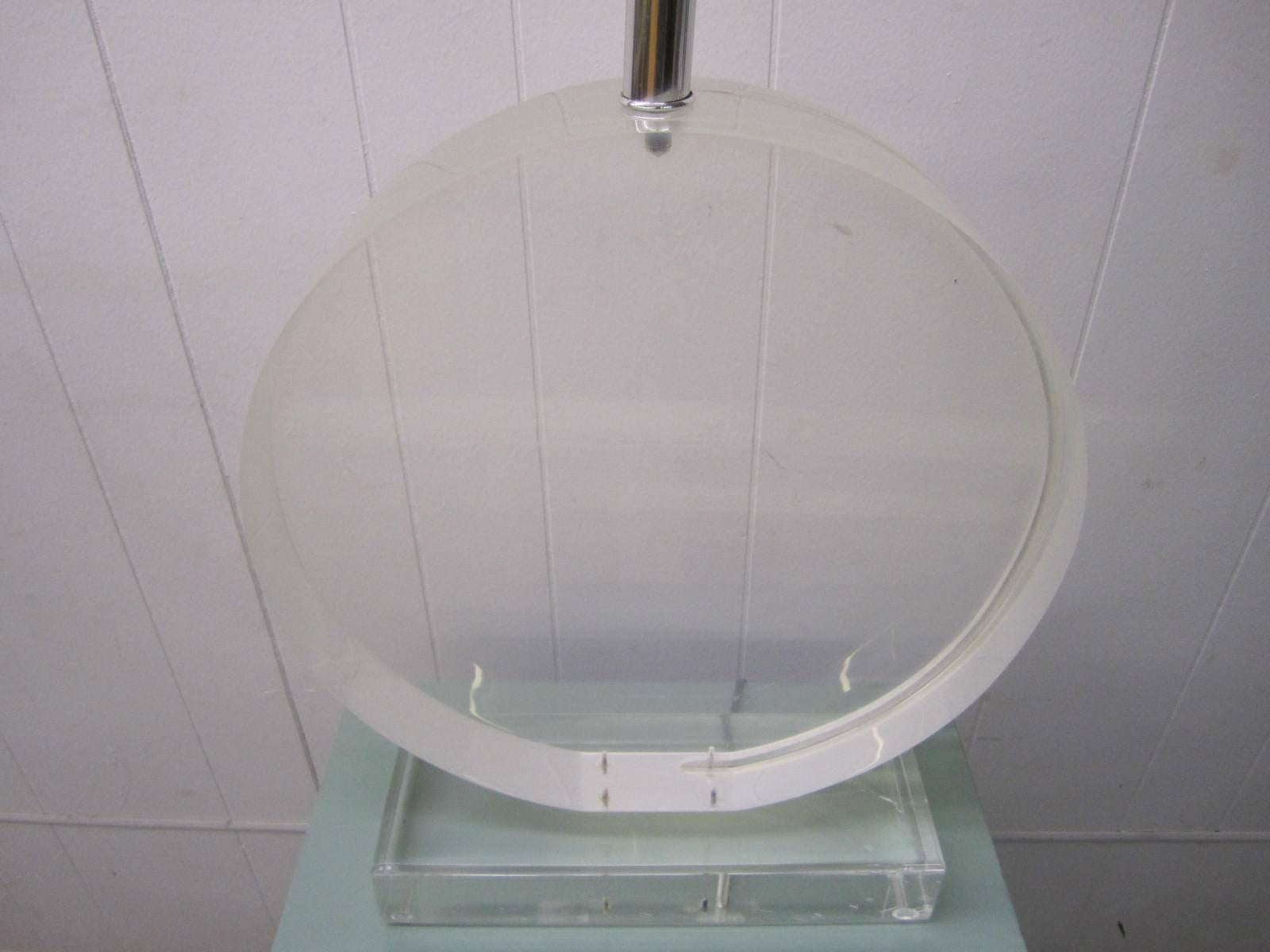 Large-scale heavy Lucite lamp in the style of Karl Springer. The lamp is truly magnificent in person and must weigh at least 40lbs. There are no vertical lines in the lamp-it was pictured in front of beadboard paneling.