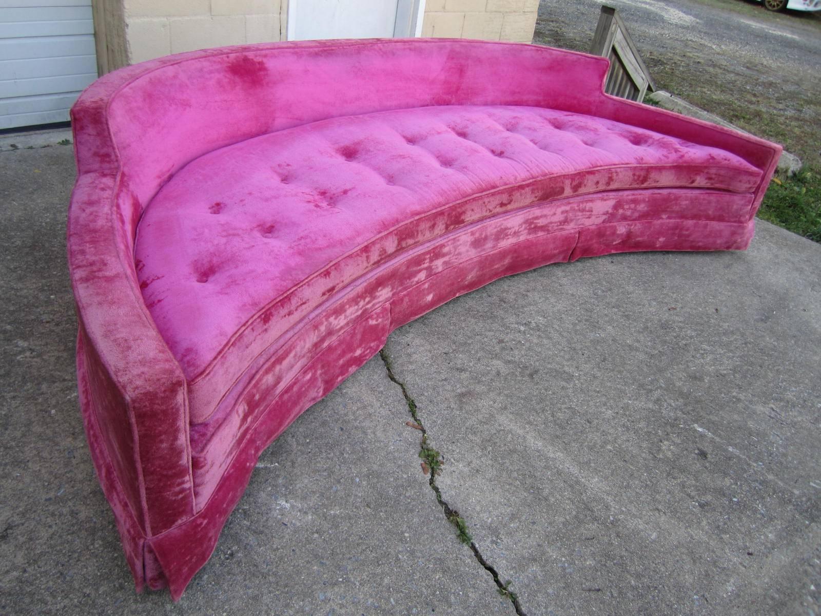 Stunning Harvey Probber crescent shaped sofa in amazing vintage condition. You mind will be blown with how fabulous this piece really is. It was re-upholstered in the 1970s with this breathtaking hot pink crushed velvet fabric still in fantastic