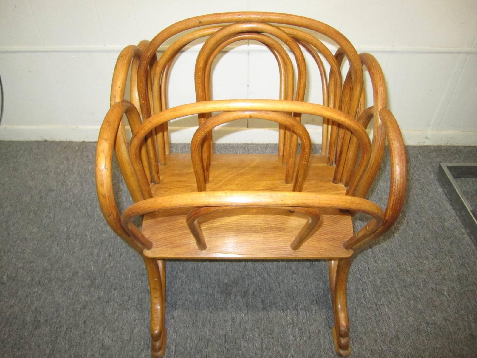 Rare early Thonet bentwood magazine rack. Very nice original condition. We love the form and function of this very decorative piece-can be used in any room of house. Makes your stack of magazines that you just can't part with look super stylish.