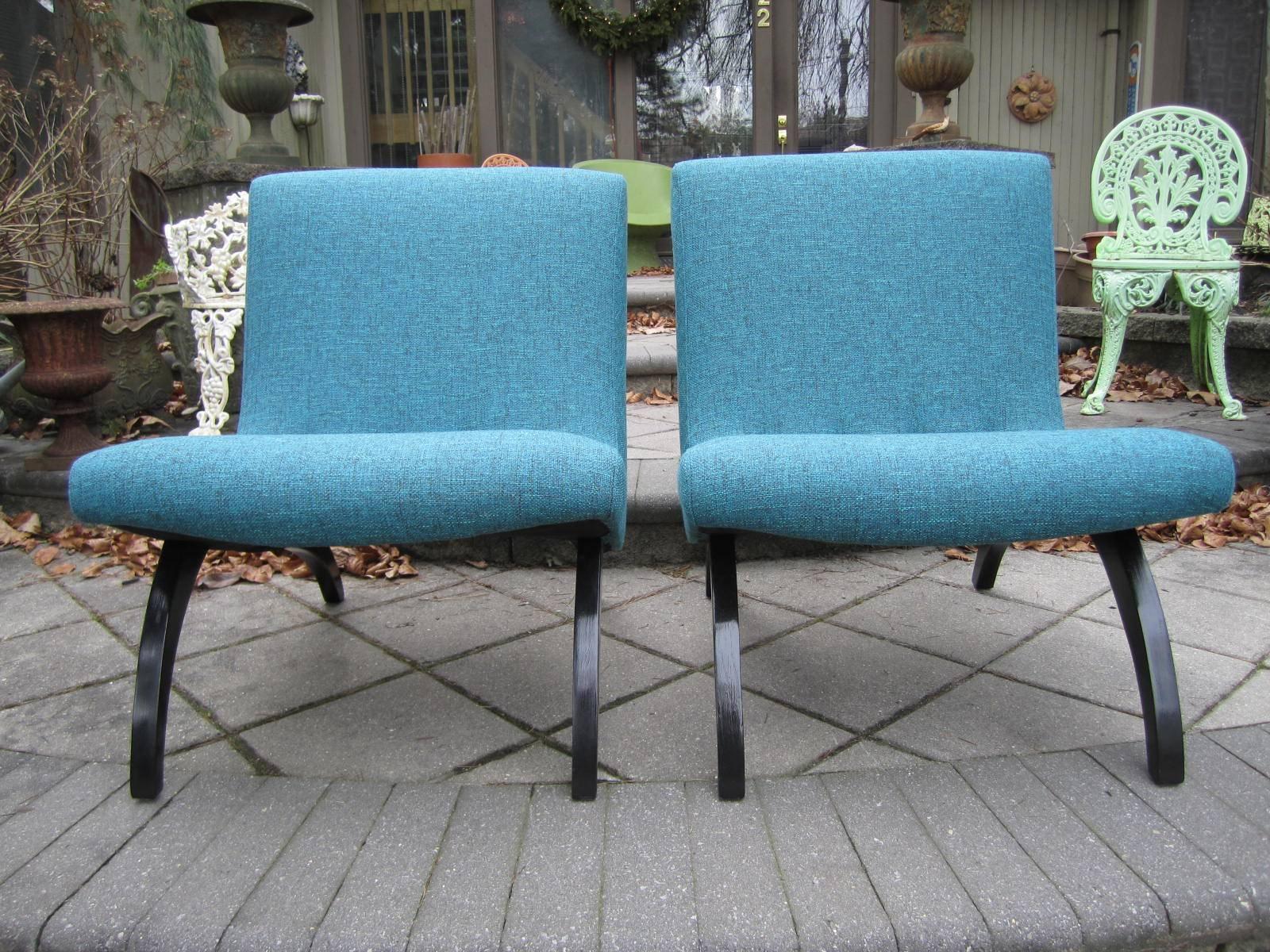Pair of scoop chairs in the style of Milo Baughman. Legs newly re-lacquered in black with newly upholstered seats in gorgeous woven turquoise fabric color called Pool.