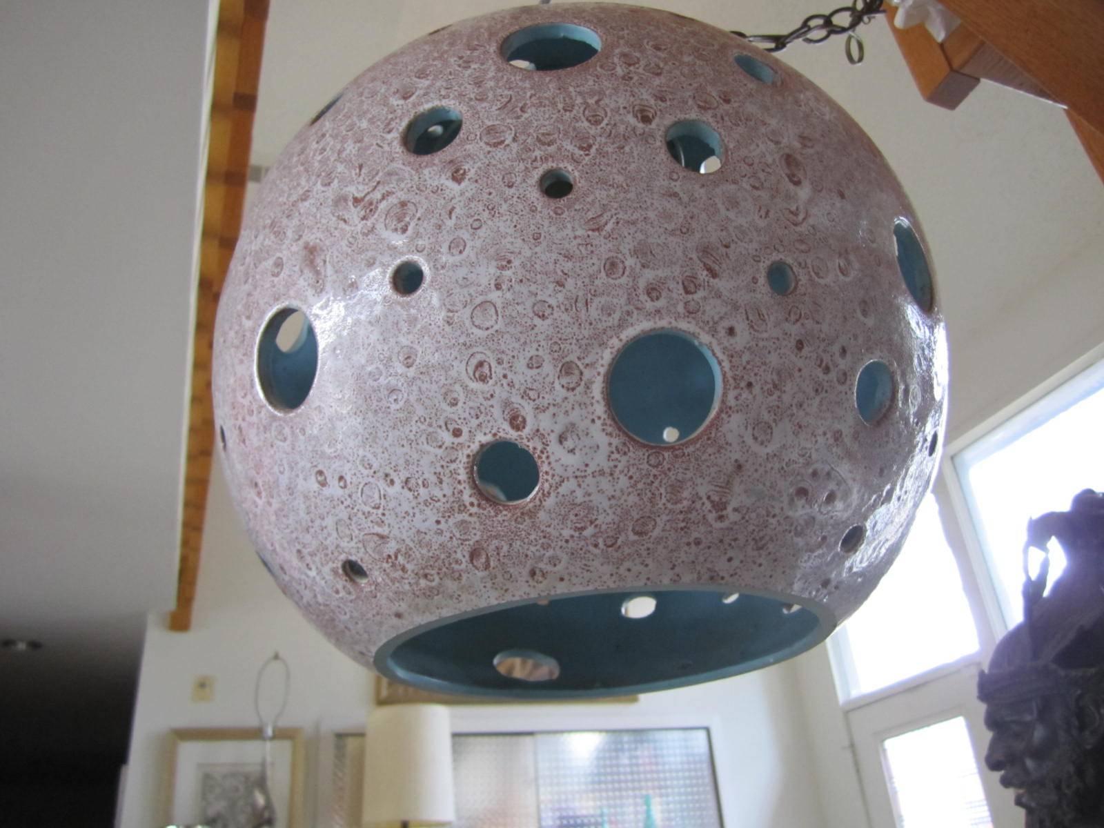Great looking pair of large-scale ceramic ball hanging fixtures. Each ball is 14
