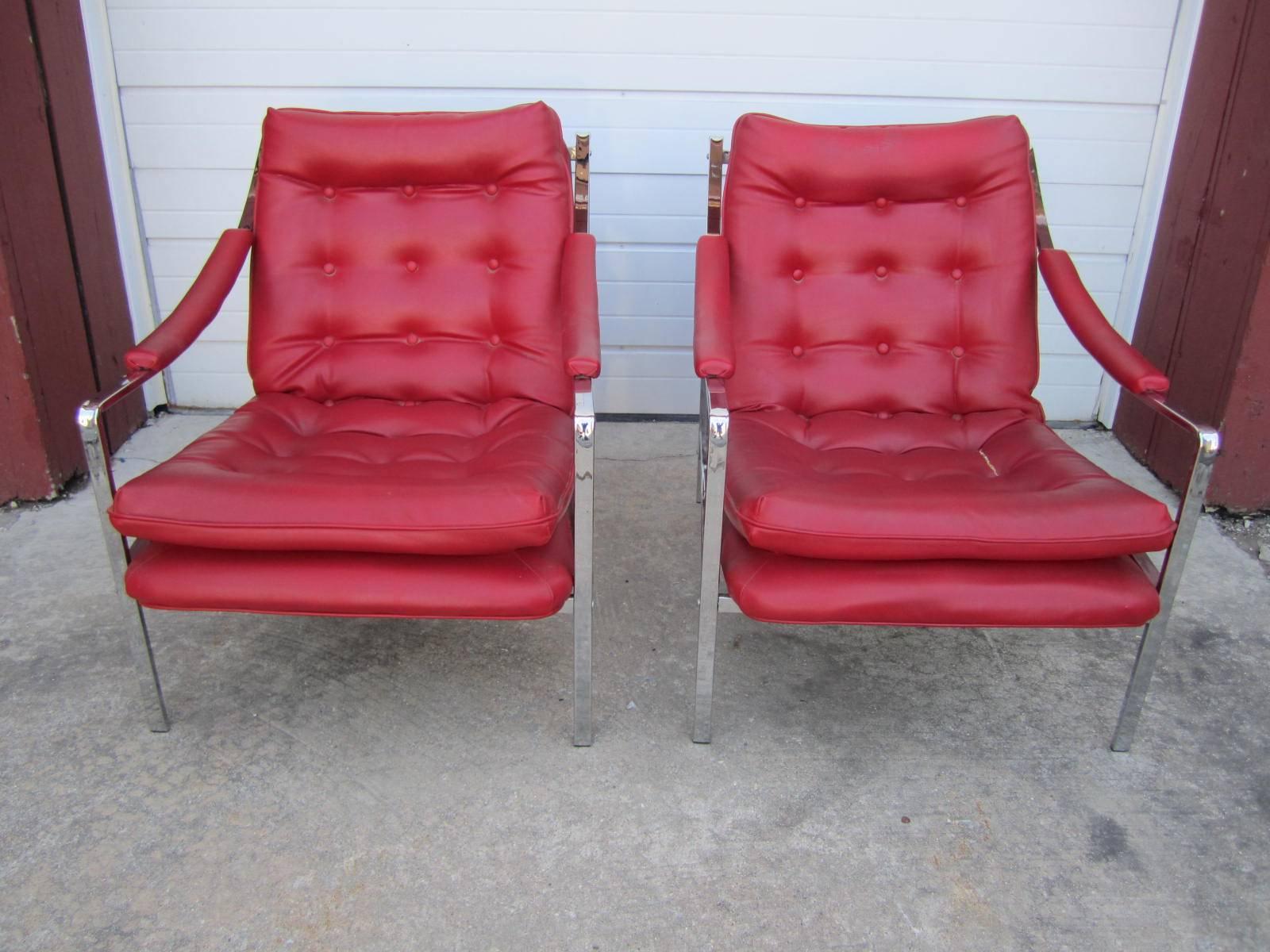Lovely pair of Milo Baughman style chrome scoop lounge chairs. This pair will definitely need new upholstery but that's what you designers are looking for anyway right ?