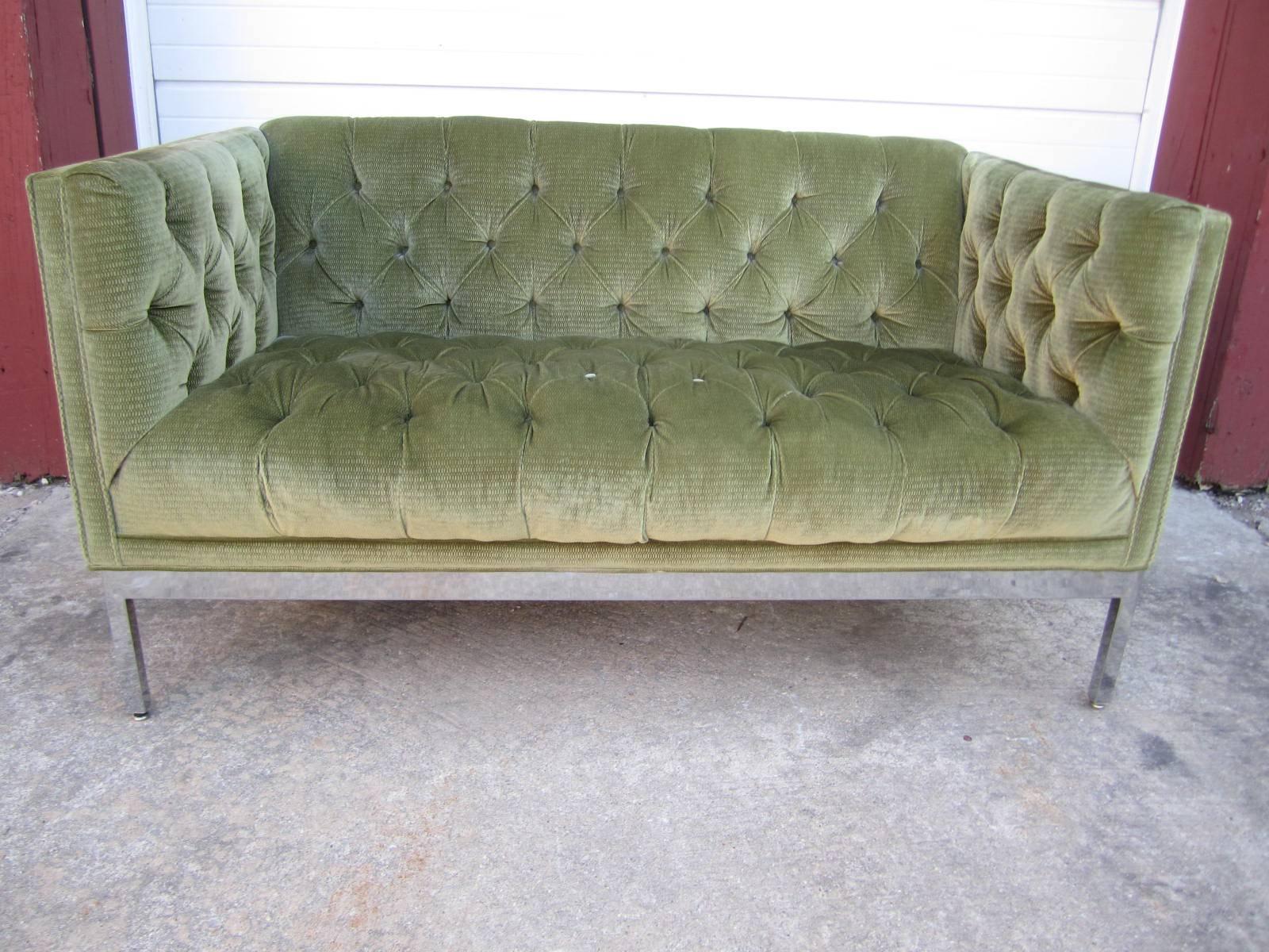 Gorgeous pair of Milo Baughman style tufted loveseats. The fabric on each is different but still in good condition. These would be fabulous reupholstered in matching fabric. Heavy chromed frames are in great condition.