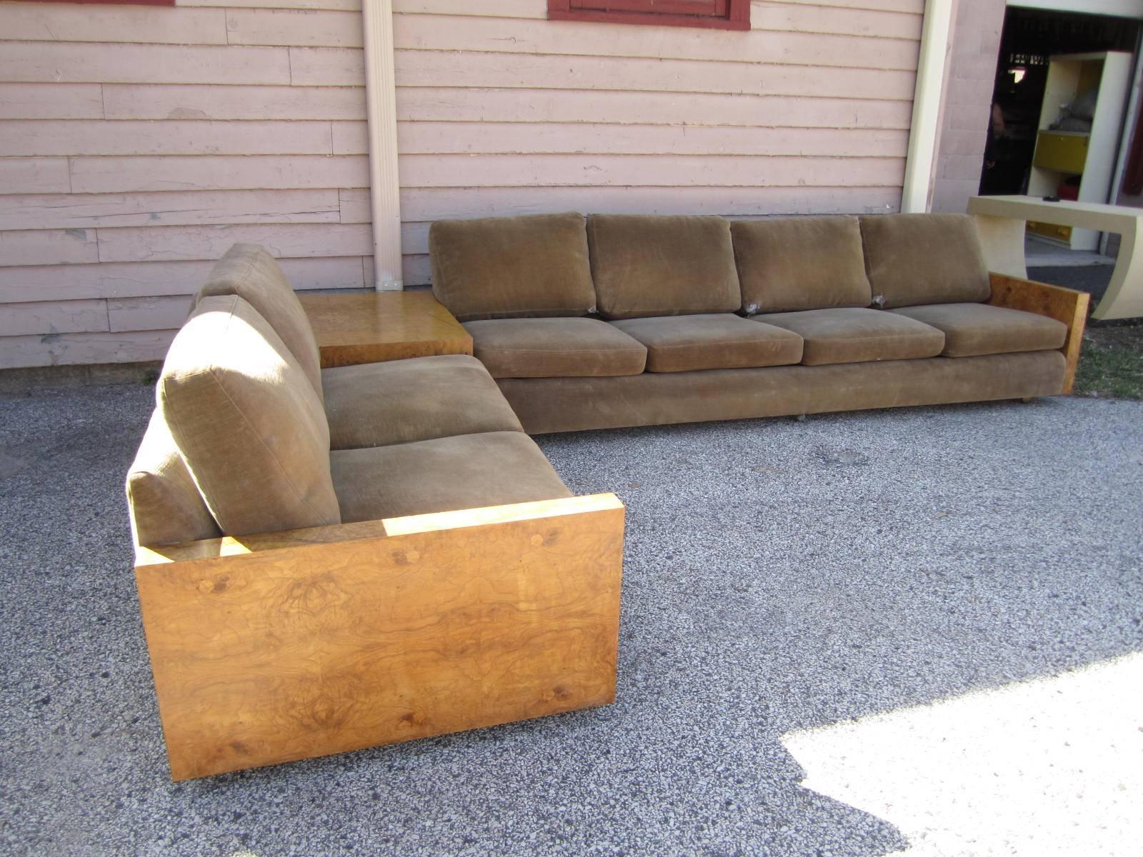 Gorgeous Milo Baughman three-piece sectional sofa. This set includes the three-seat sofa, square Parsons table and two-seat loveseat. This set will definitely need to be reupholstered but that what you designers are looking for anyway-right? The