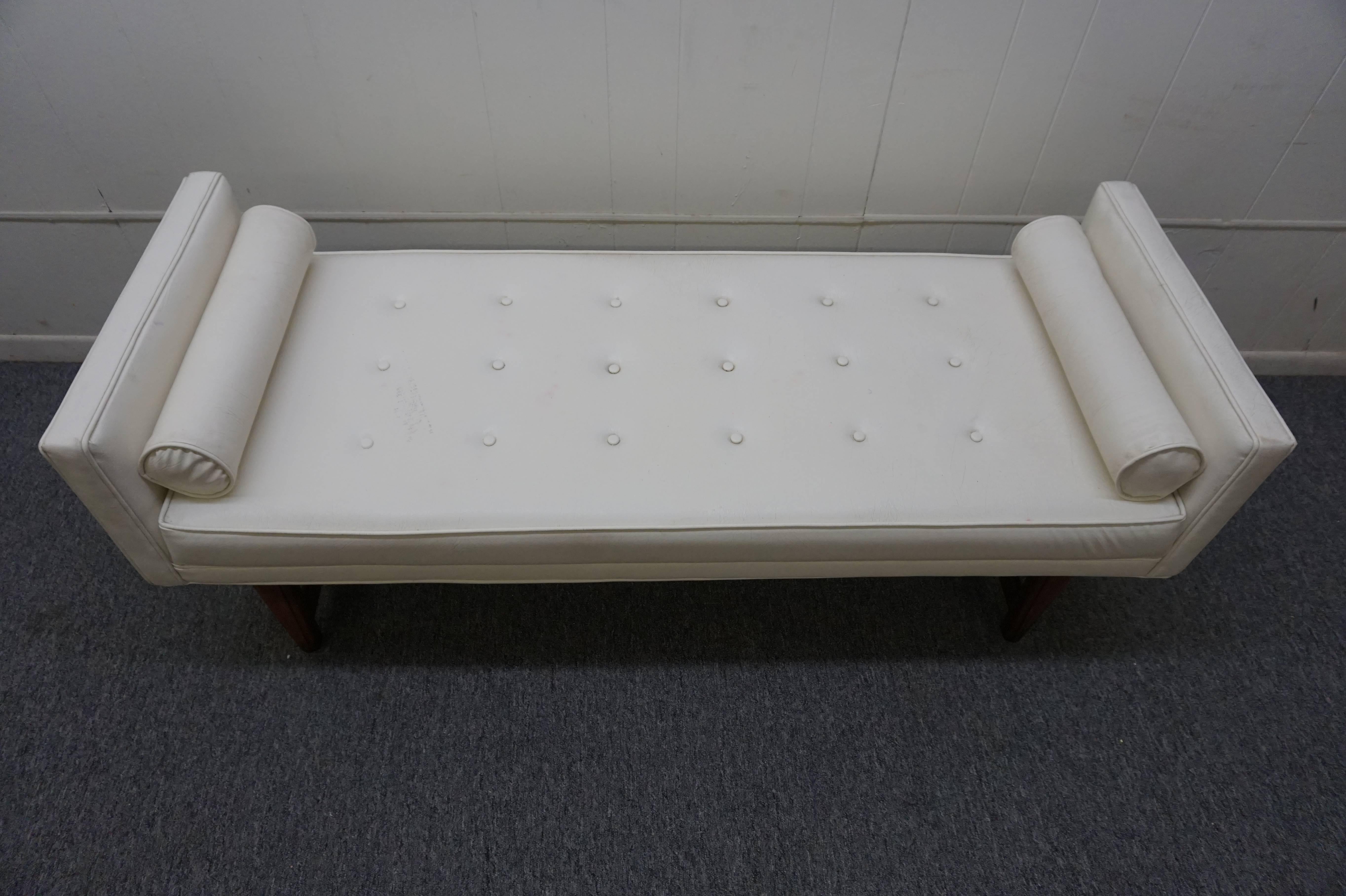 Handsome American Mid-Century Modern upholstered bench with lovely walnut base. We love the high sides with cylinder pillows and button tufted seat. Great piece used at the foot of the bed or in entry hall.
