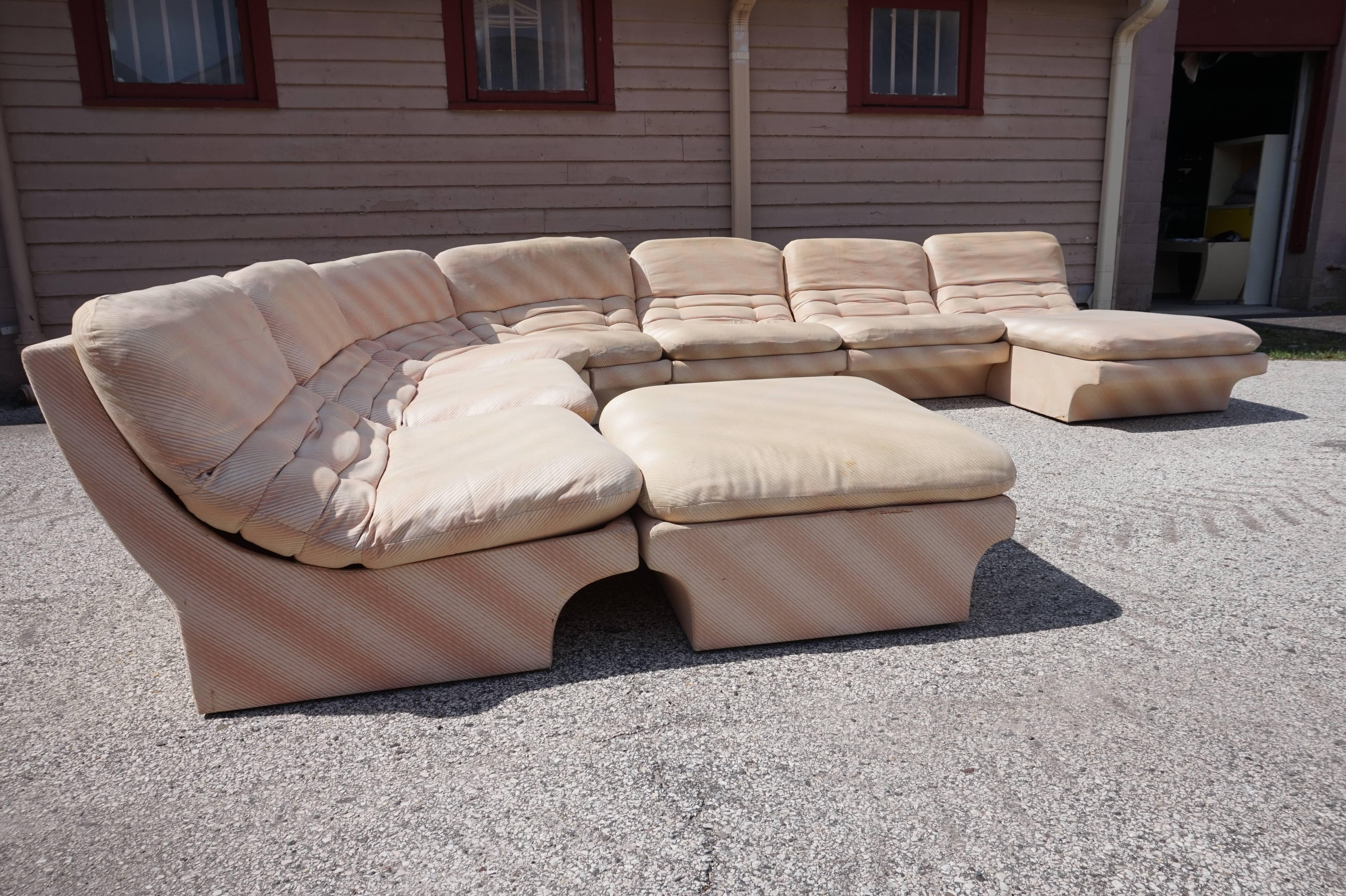 Awesome eight part sectional sofa by Preview in the style of Vladimir Kagan. This set will need to be reupholstered but that is what you designers are looking for any way-right? This set measures 30" T x 149" L x 110" D as shown.