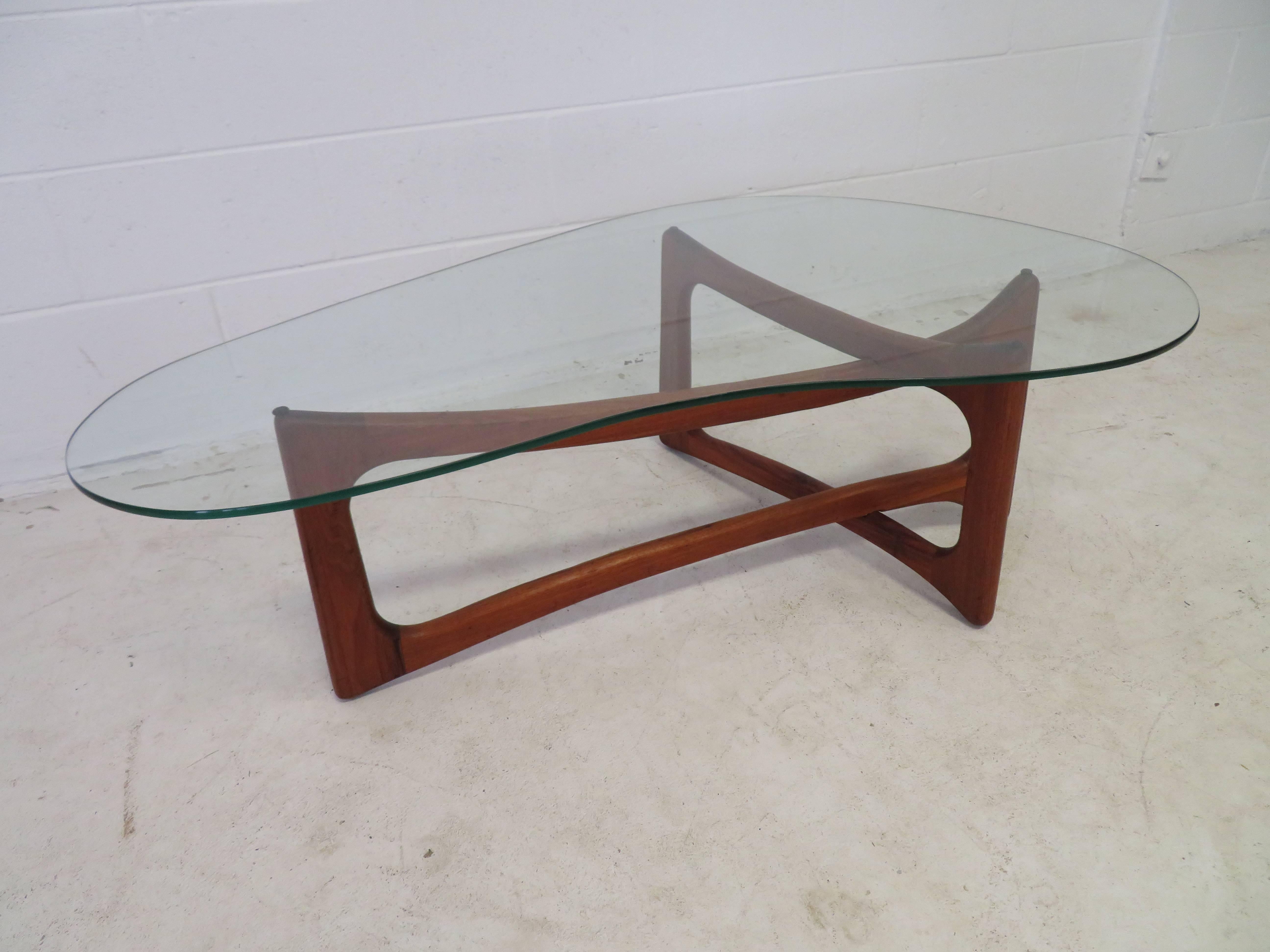 Wonderful and iconic Adrian Pearsall sculptural walnut coffee table. This is a Fine example of this amazingly designed table. The Fine crafted walnut base has a oil rubbed finish that is original. I love the original finish, the wood seems a bit