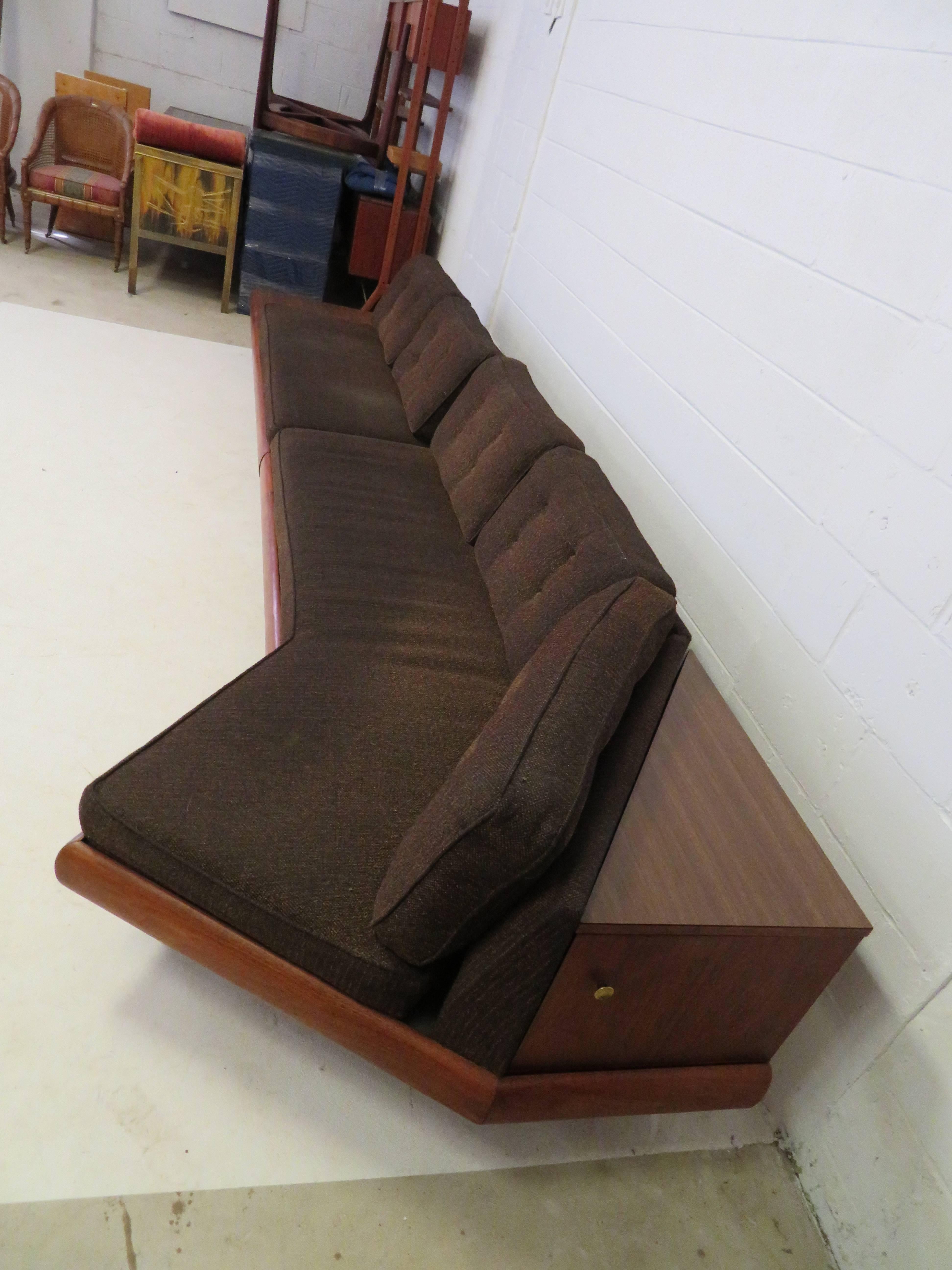 Unusual Adrian Pearsall two-piece boomerang sectional sofa with two attached tables. One table has a triangular shaped cabinet with door for secret storage. This sofa set up is rare because it has two pieces instead of the huge one-piece boomerang