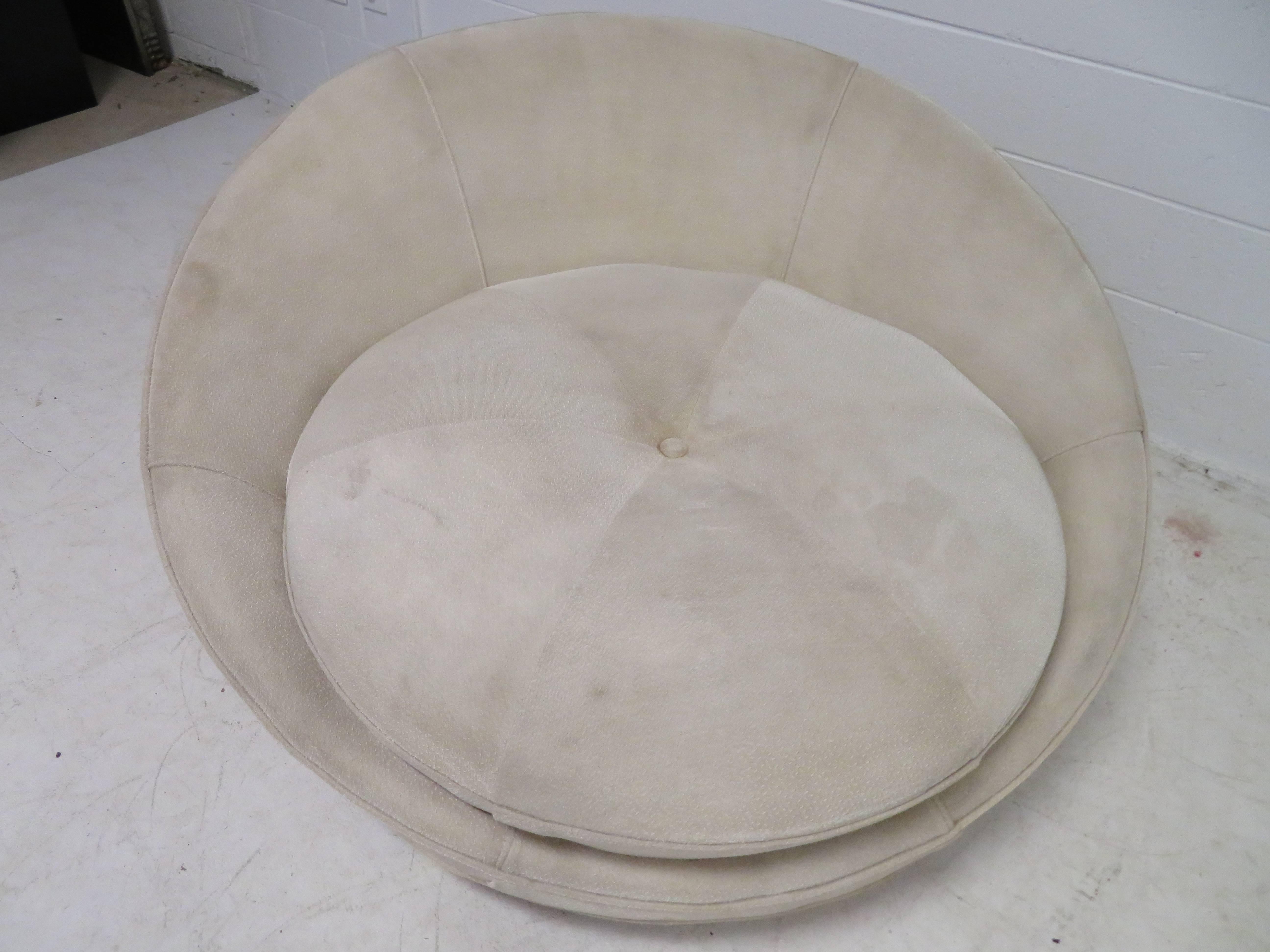 Large scale Milo Baughman round chaise longue chair. This piece will need to be reupholstered but that's what you designers are looking for anyway-right? We have a pair of these if your design calls for 2.