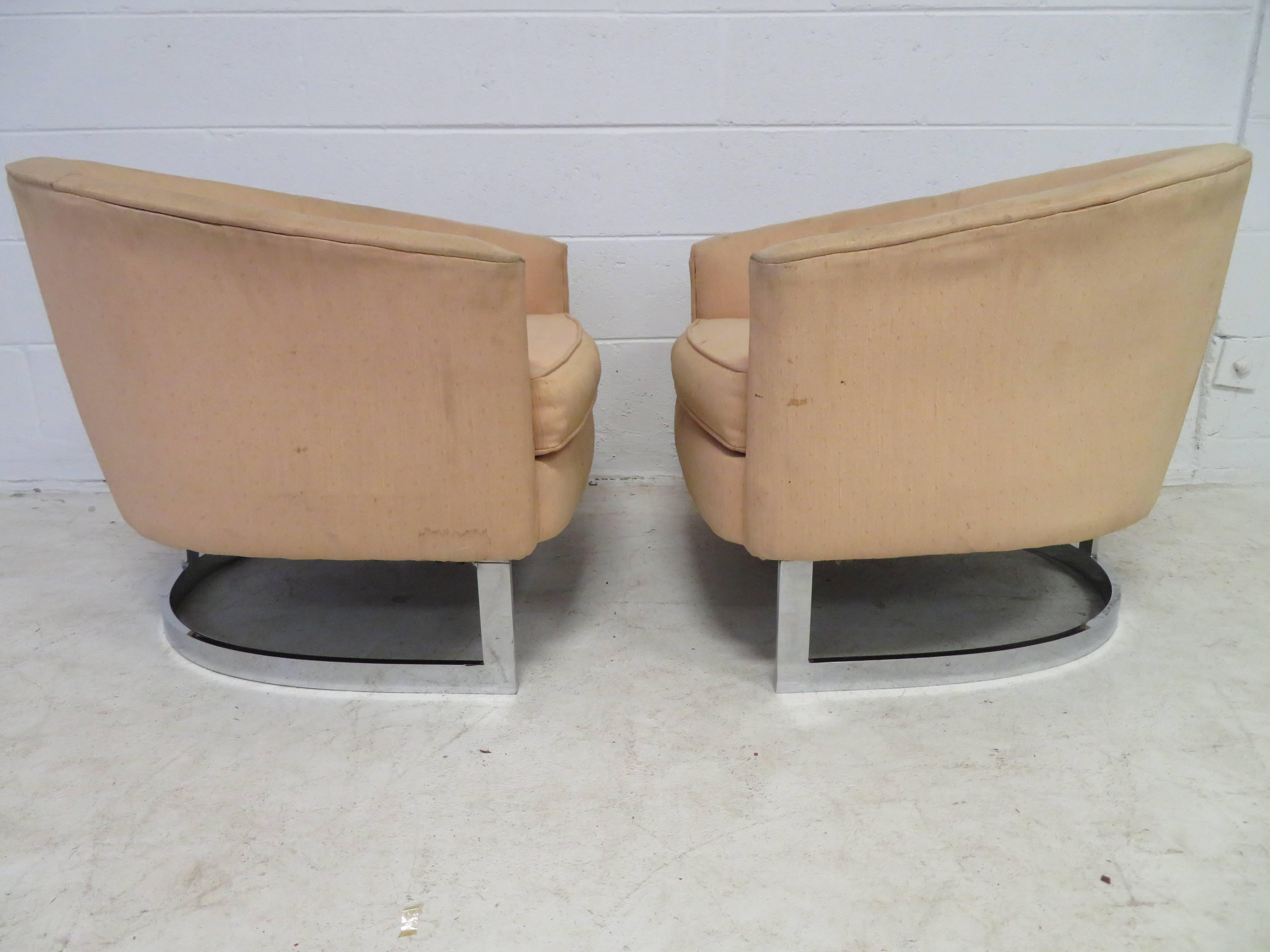 Nice pair of Milo Baughman style wide barrel back chrome base chairs. These will need reupholstery but that's what you designers are looking for anyway-right? The chrome bases look great with only some light wear.