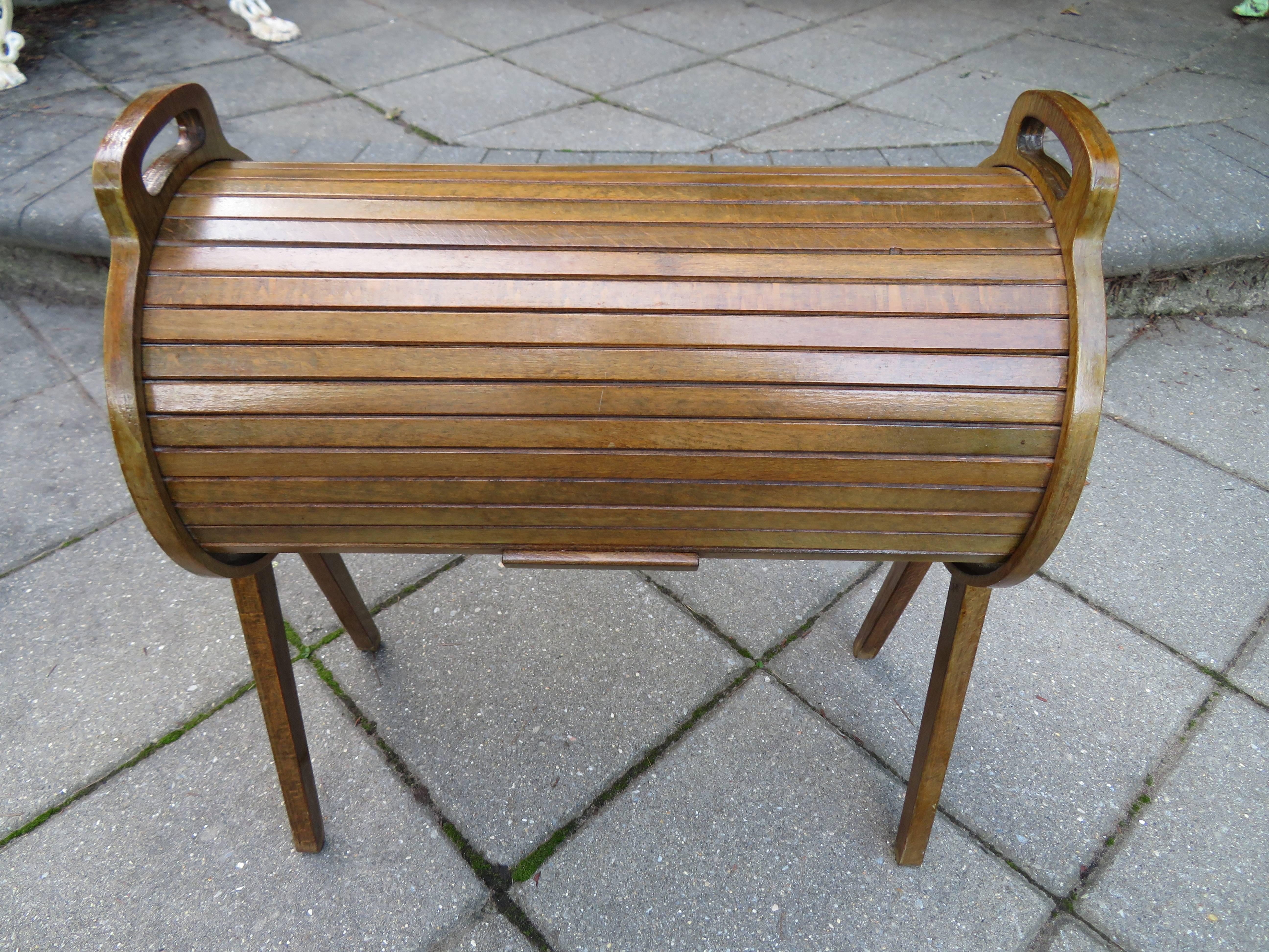 Wonderful Danish modern style cylindrical roll-top sewing caddy/basket. We just love this unusual piece which can be used for storage of anything really-sewing,knitting, or crafts.
