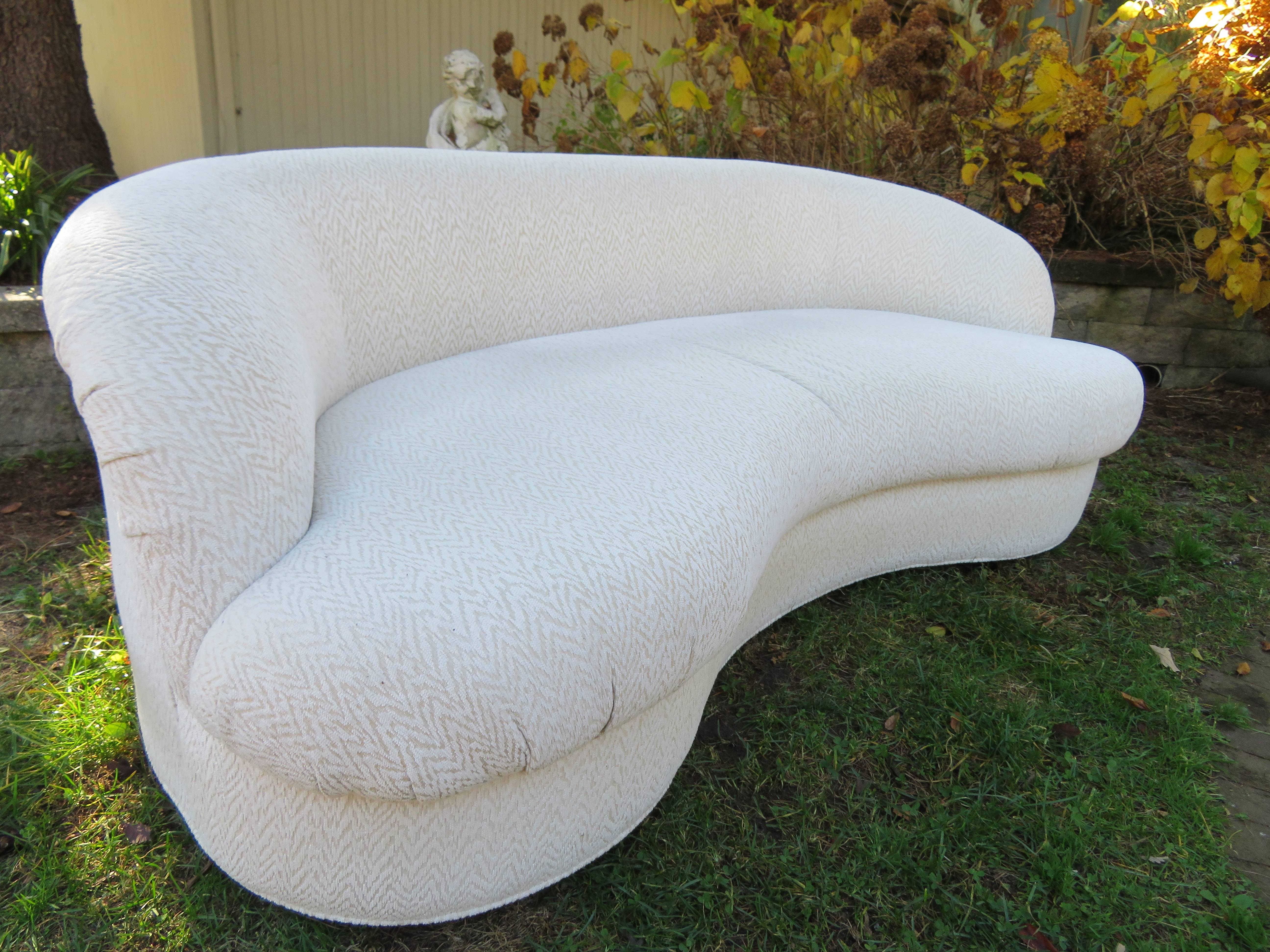 Excellent pair of kidney shaped sofas-Vladimir Kagan style. This pair is super clean and in excellent condition.