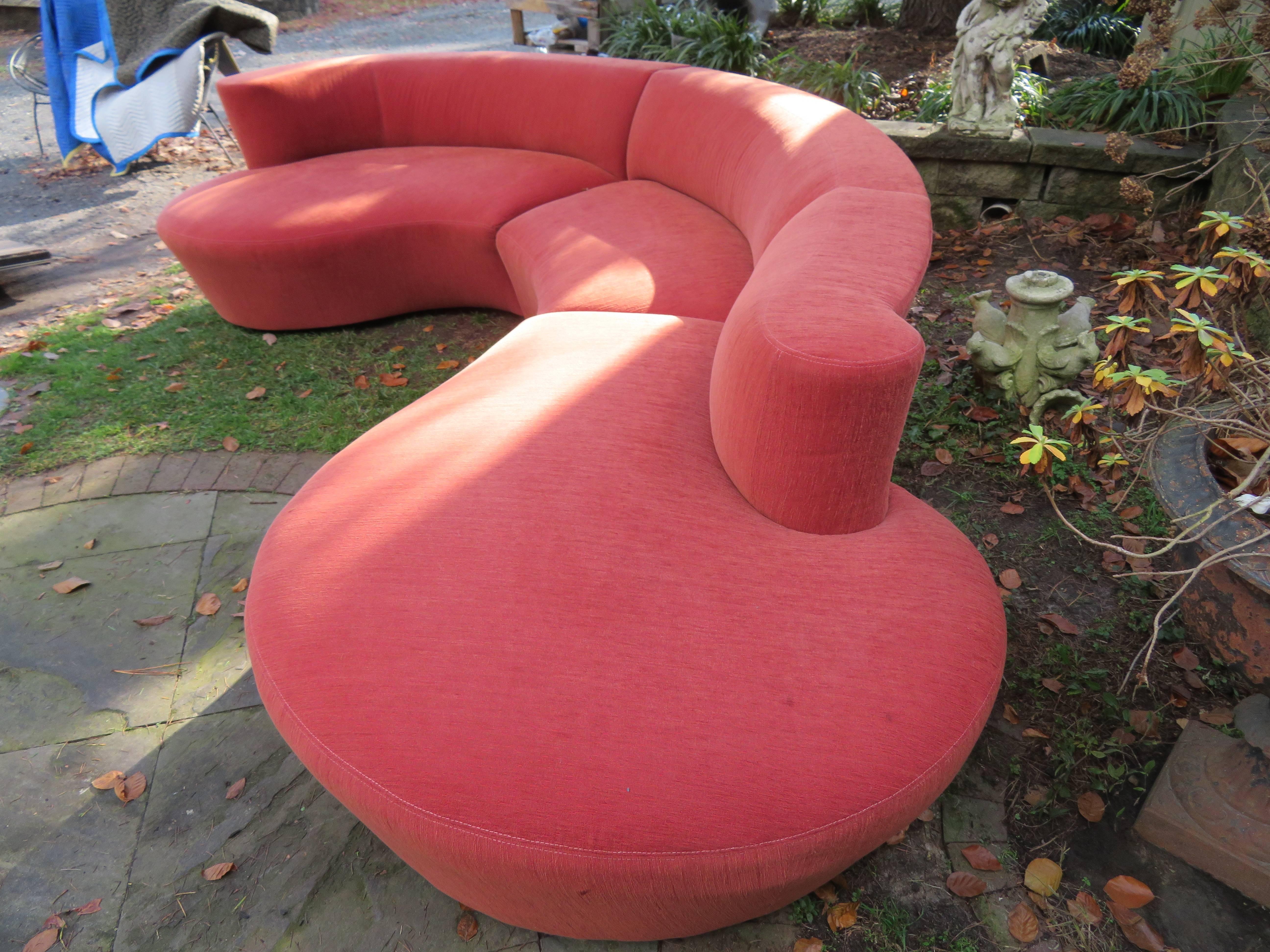 Excellent Vladimir Kagan three-piece serpentine sofa sectional by Weiman. This sofa section is fabulous in person with little to no wear to the original sunset orange fabric. Please check out the matching Nautilus chairs in another of our 1stdibs