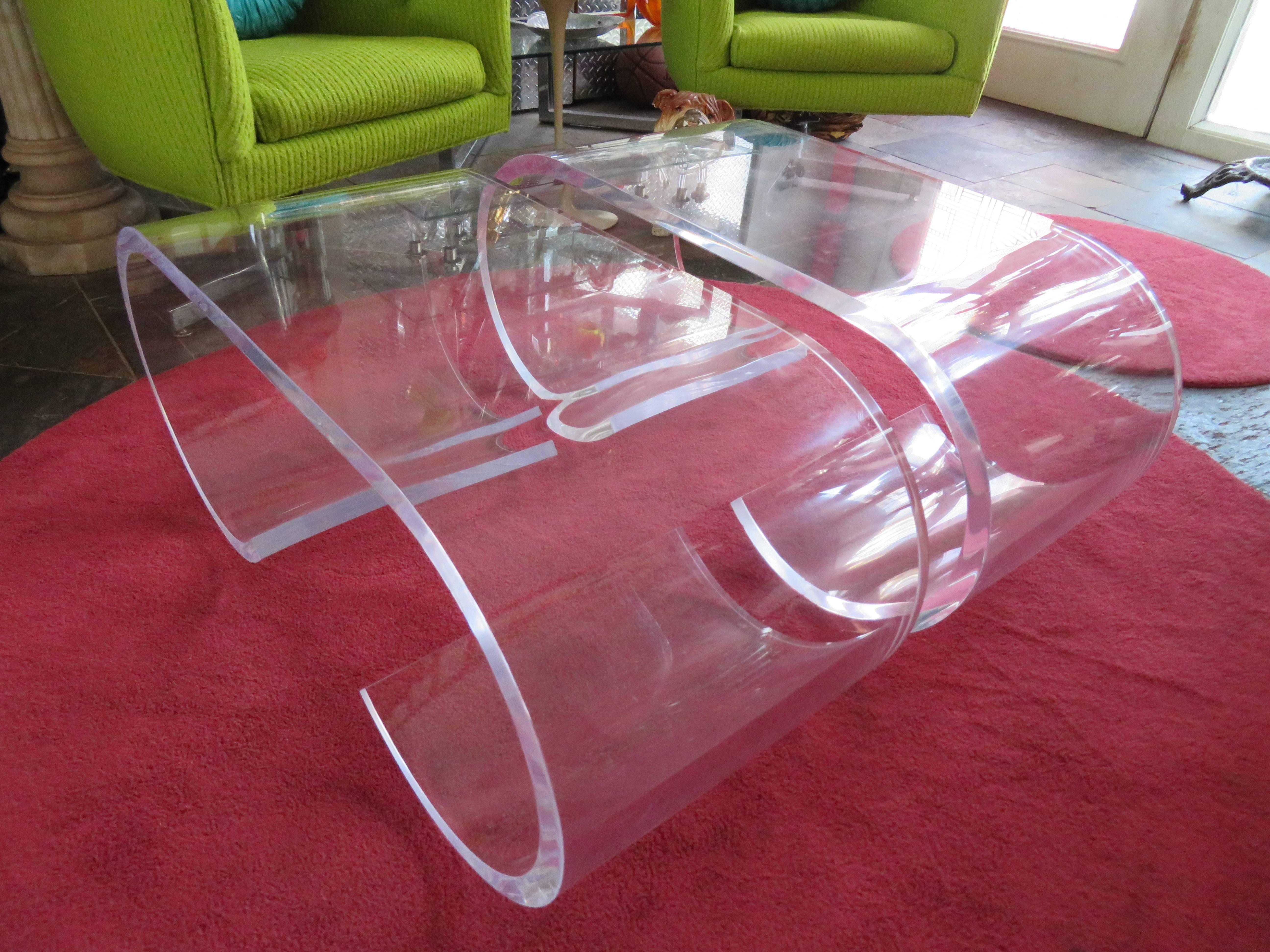 Awesome pair of Karl Springer style thick Lucite scroll coffee tables in excellent vintage condition. The last photo shows theses same table on the cover of Architectural Digest November 1977 super cool. If having one isn’t super fabulous enough we