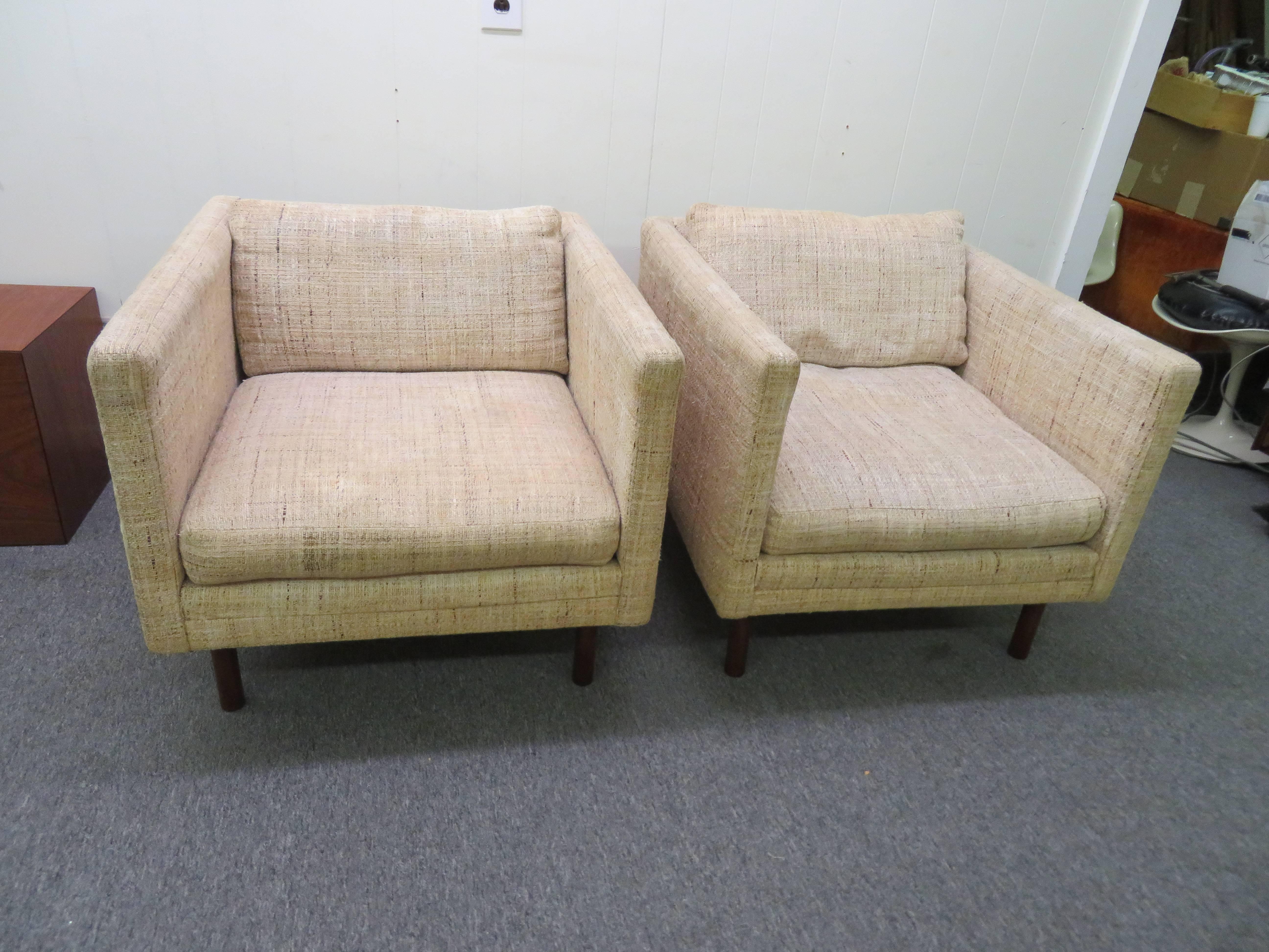 Wonderful pair of signed Milo Baughman cube chairs with gorgeous walnut legs. Yes, these will need to be re-upholstered but that's what you designers are looking for anyway-right?.