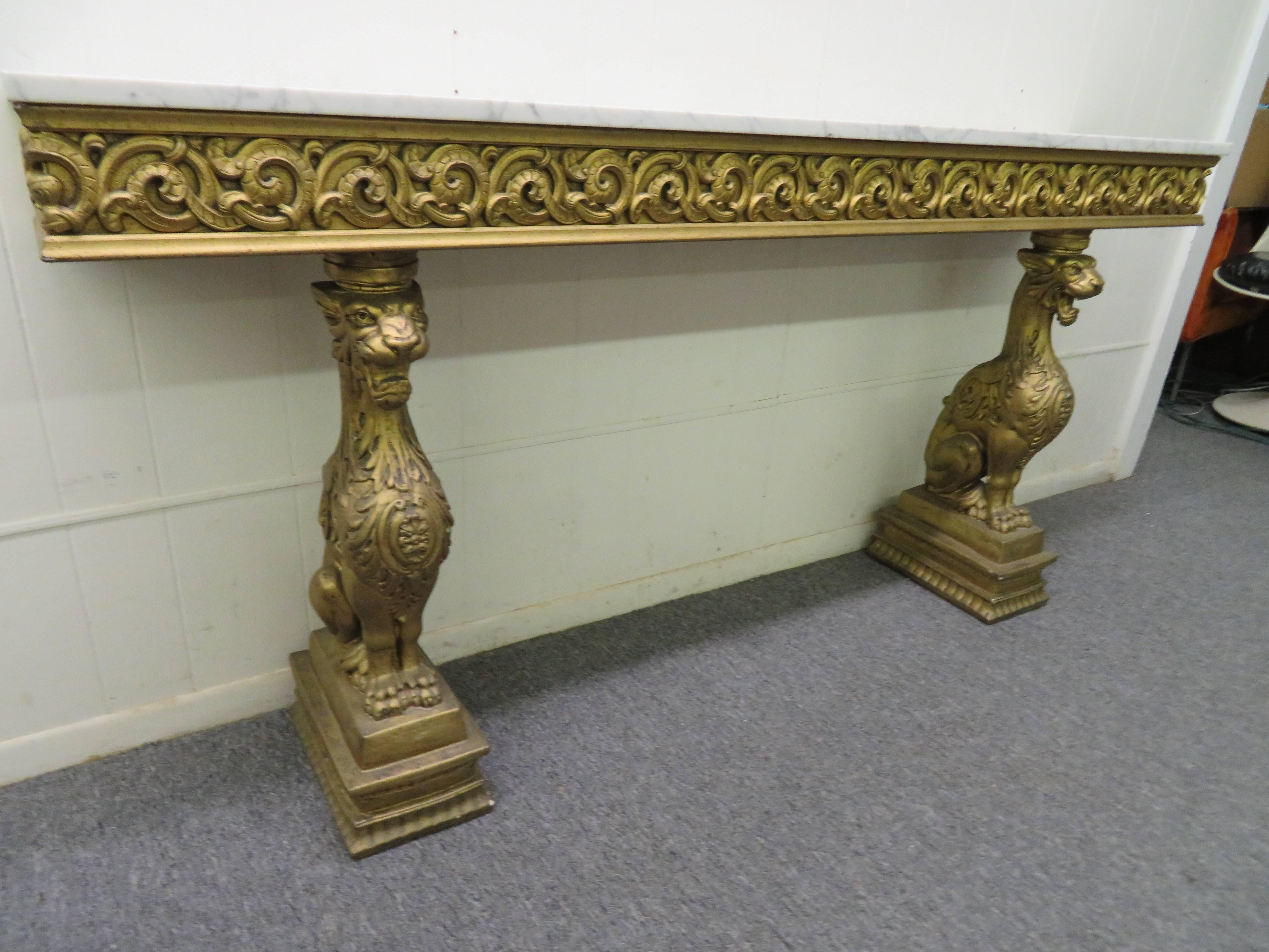 Awesome and whimsical Gothic golden griffin pier mount marble-top console table. Make a huge statement in your foyer or hallway with this fun unusual console table-can even be used as the beginnings of a mantel-super cool!