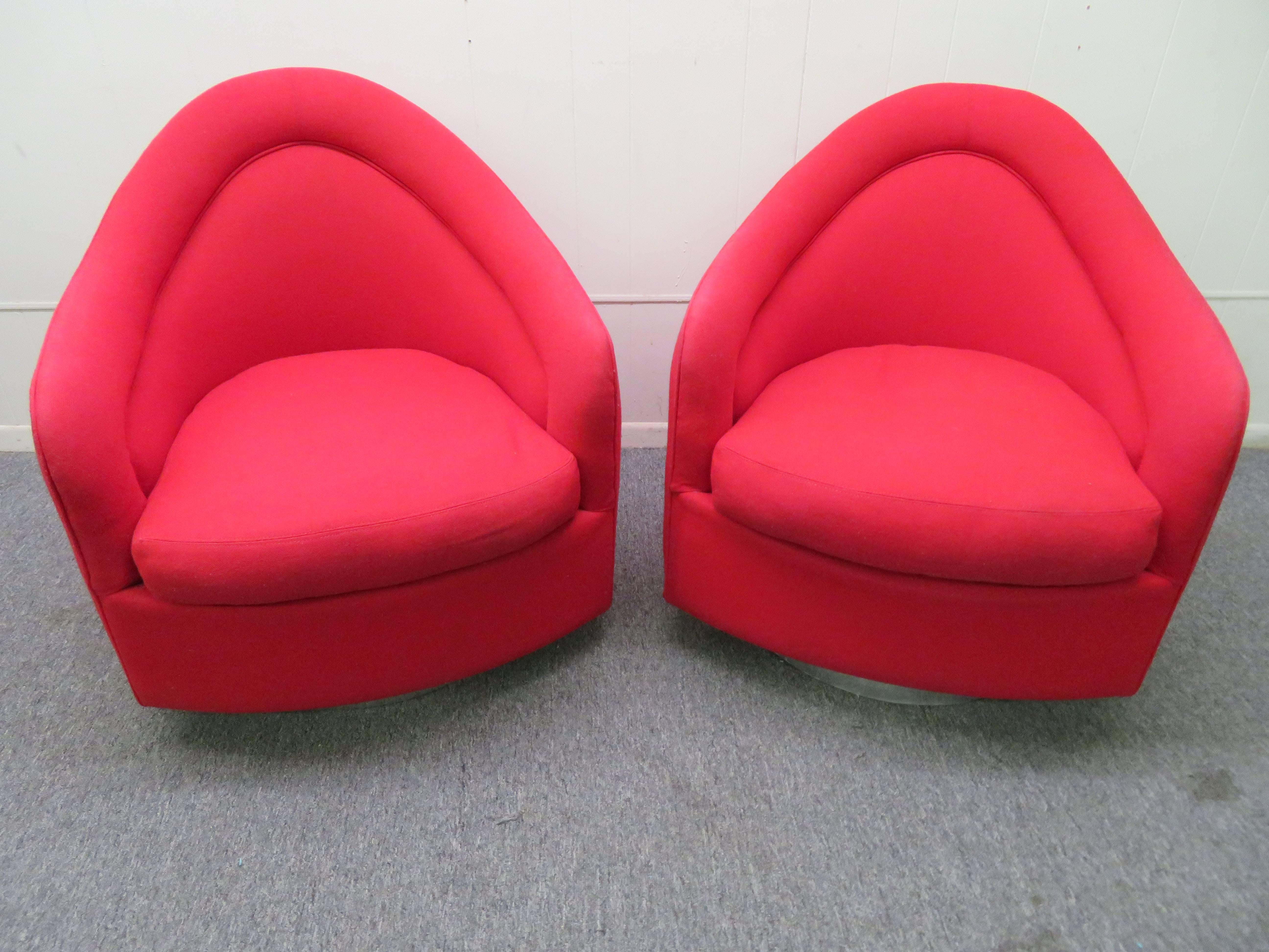 Stunning pair of signed Milo Baughman Thayer Coggin swivel rocker chairs. If you have ever sat in one of these rocking swivel chairs by Milo Baughman you would know what an experience it really is.