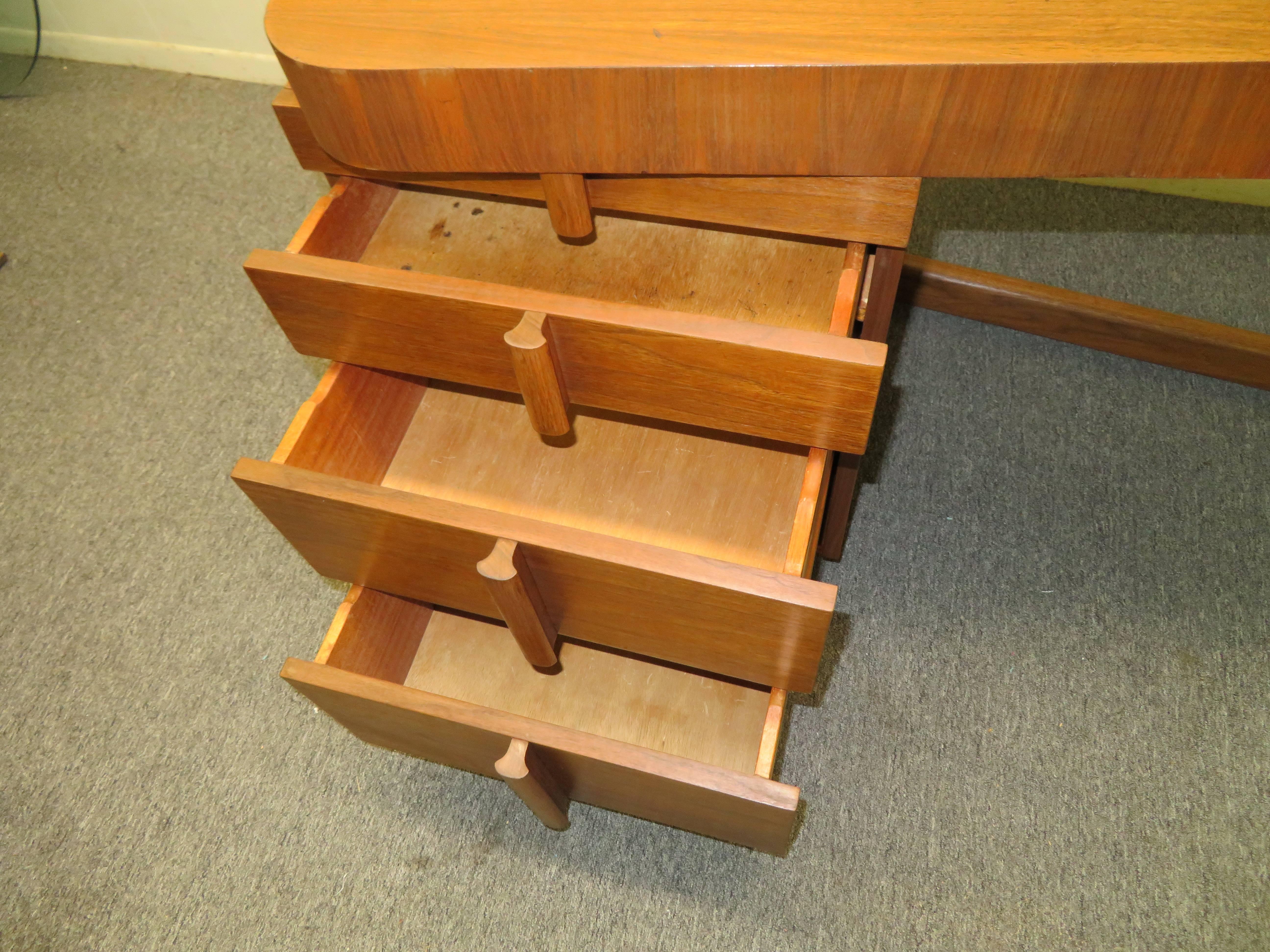 Mid-Century Modern Asymmetrical Walnut Desk Attributed to Gilbert Rohde 2
