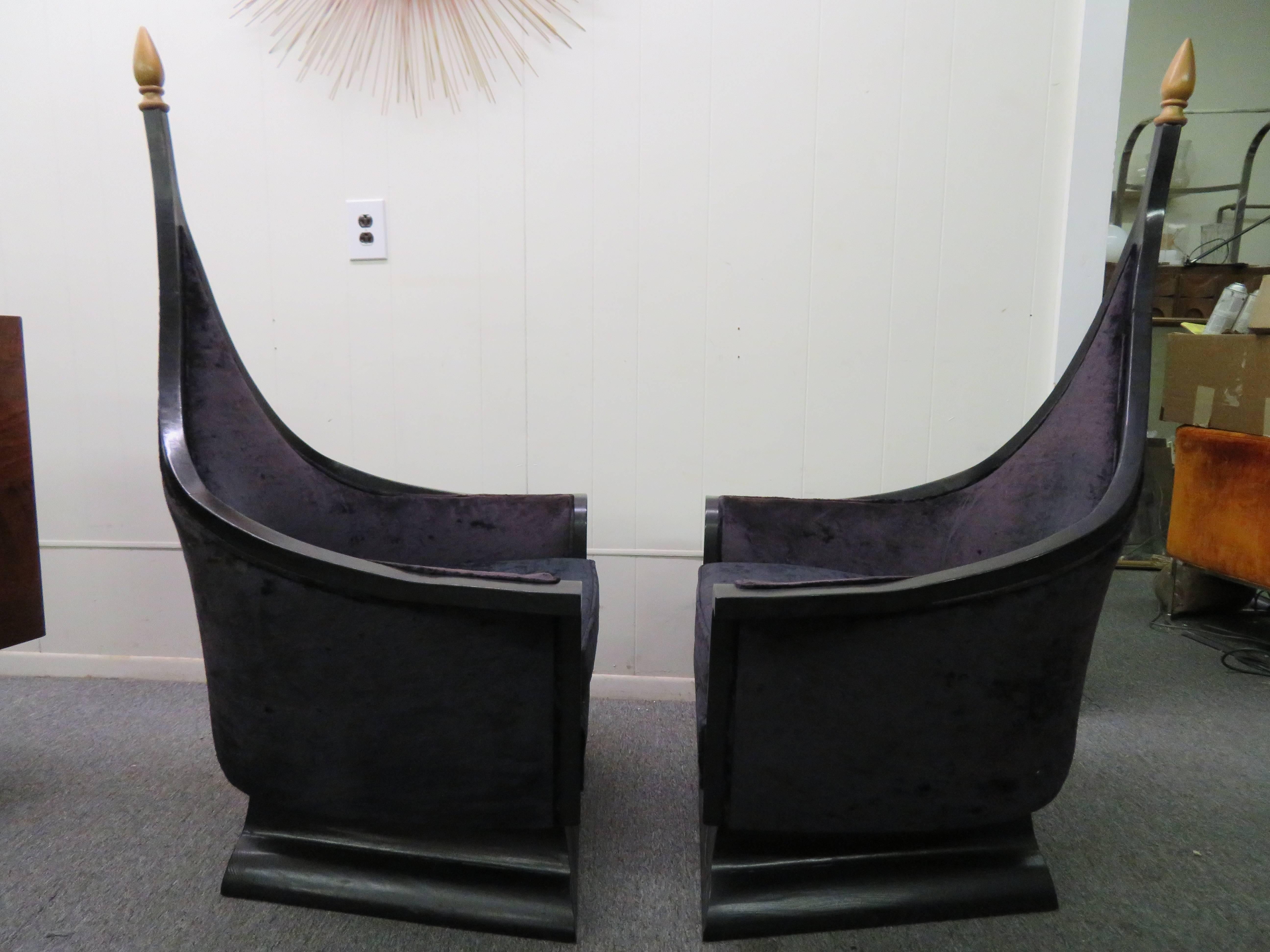 Magnificent and rare pair of Hollywood Regency James Mont style black lacquered chairs in amazing vintage condition. Believe it or not these chairs have survived so well because they been covered in plastic for the last 60 years. We have never seen