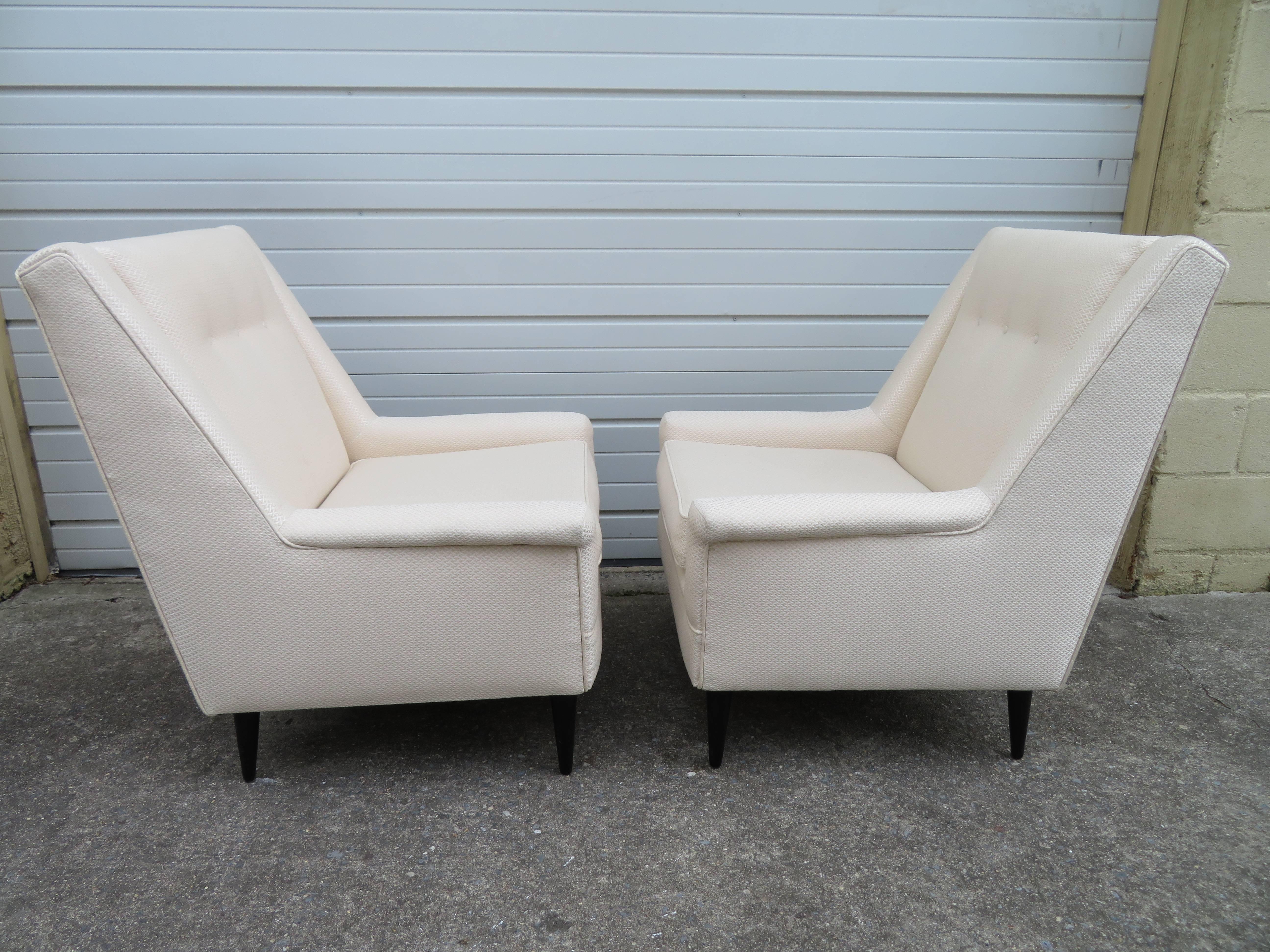 Gorgeous pair of Harvey Probber style tall back lounge chairs. The original fabric is in very nice condition-very comfortable. Legs retain their original black lacquered finish-minor scuffs.