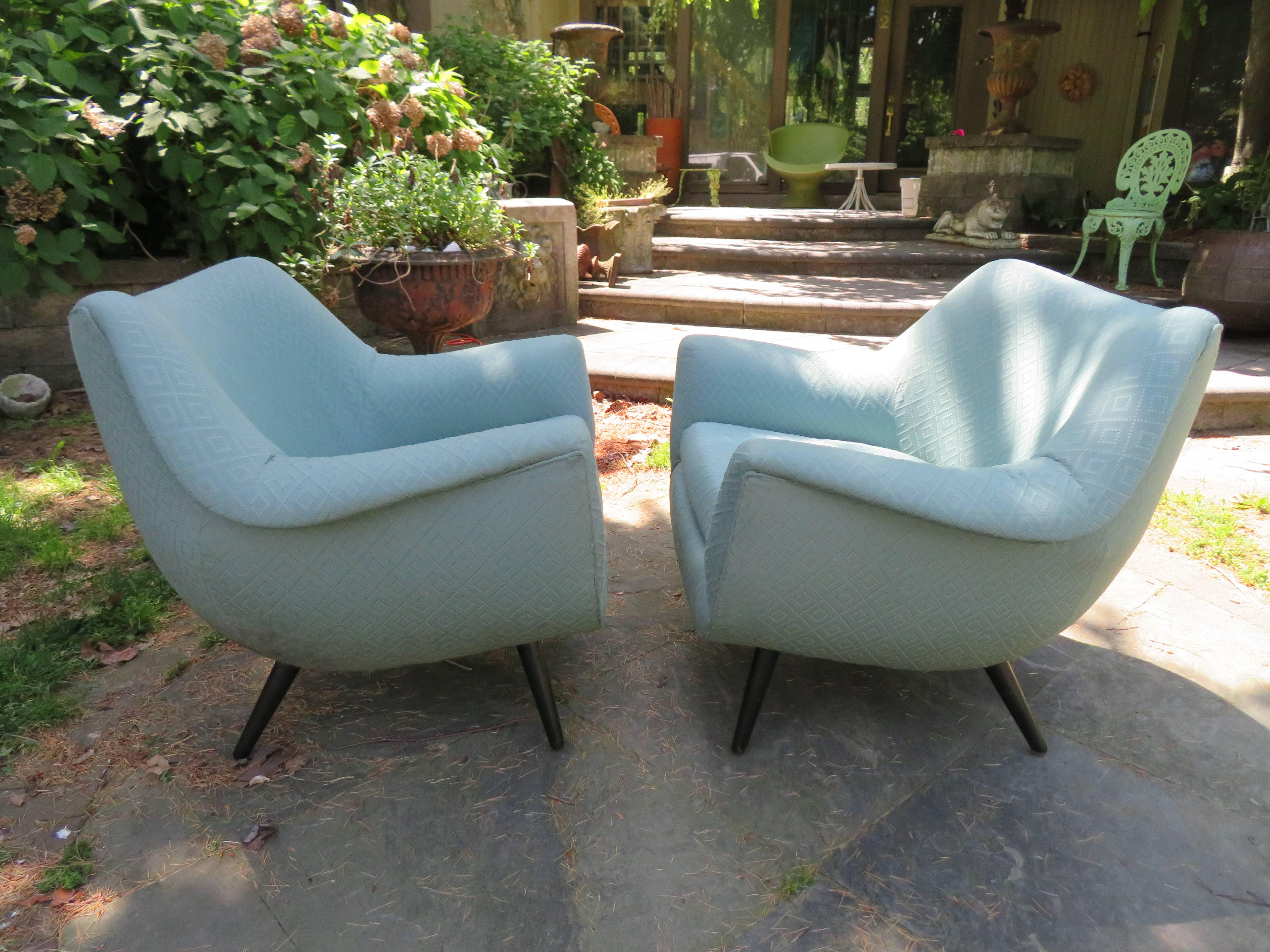 Gorgeous pair of Selig Lawrence Peabody barrel back tub chairs. This pair will need to be reupholstered but that's what you designers are looking for anyway-right? We love the large-scale wide flair arms with the deep barrel backs and sexy long