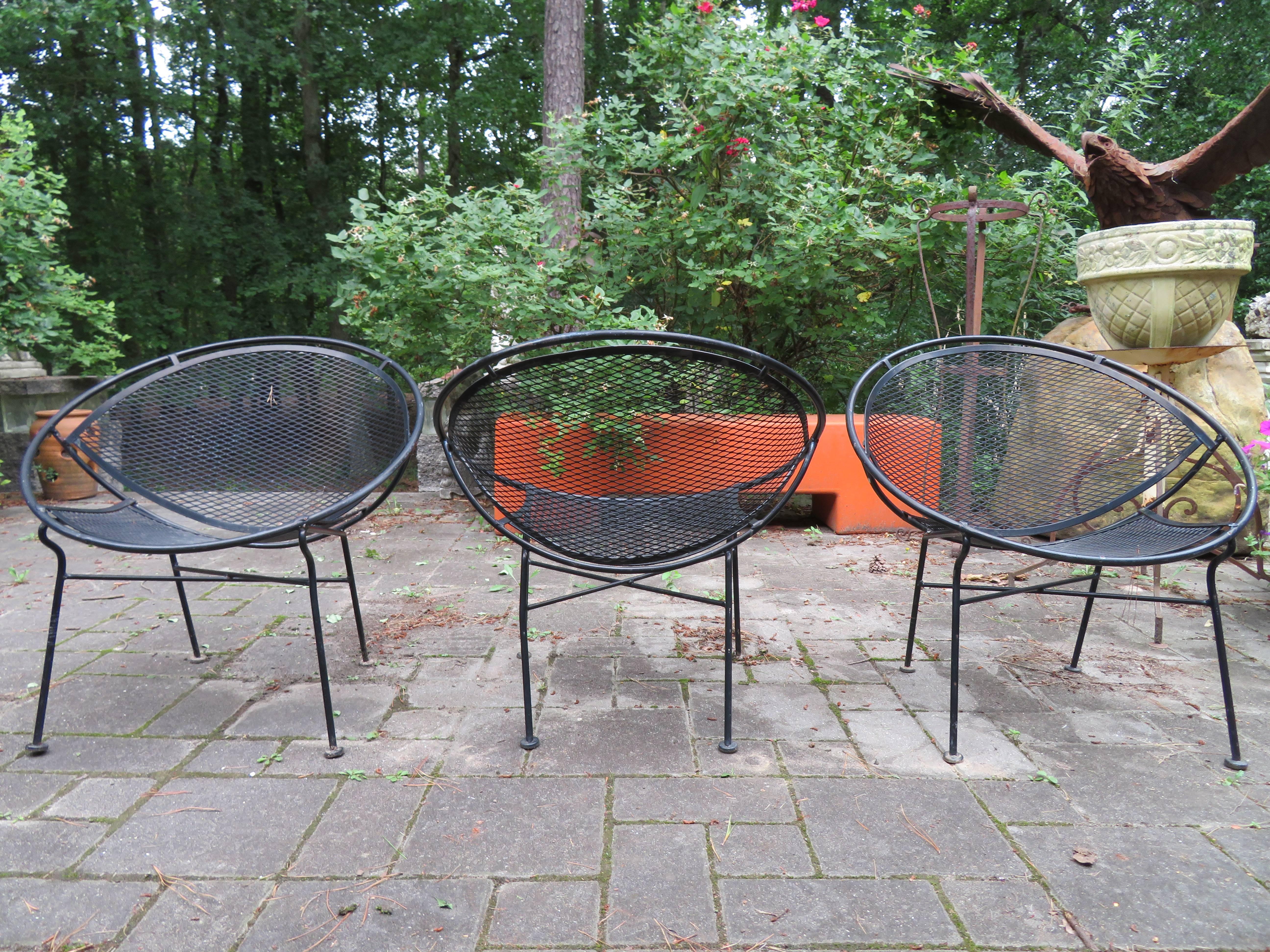 Great set of six Maurizio Tempestini for Salterini iron hoop chairs with their original black painted finish. Wonderful round frame, mesh seat, and strong iron legs in fantastic vintage condition.