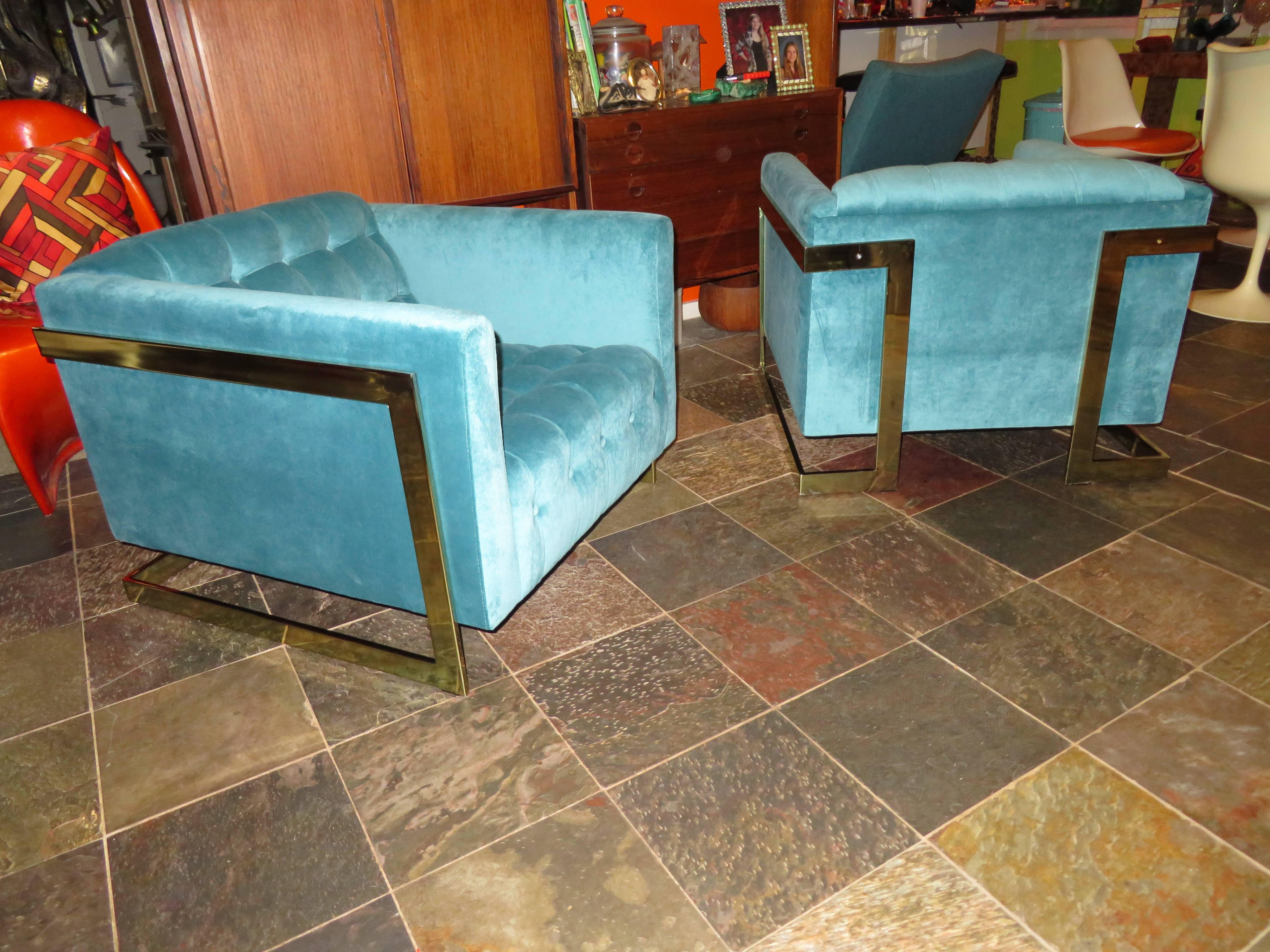 Magnificent Milo Baughman style pair of biscuit tufted brass cube lounge chairs by Carsons of High Point. This pair is in excellent condition with brand new high end peacock blue velvet upholstery and shiny brass frames. The original finish on the