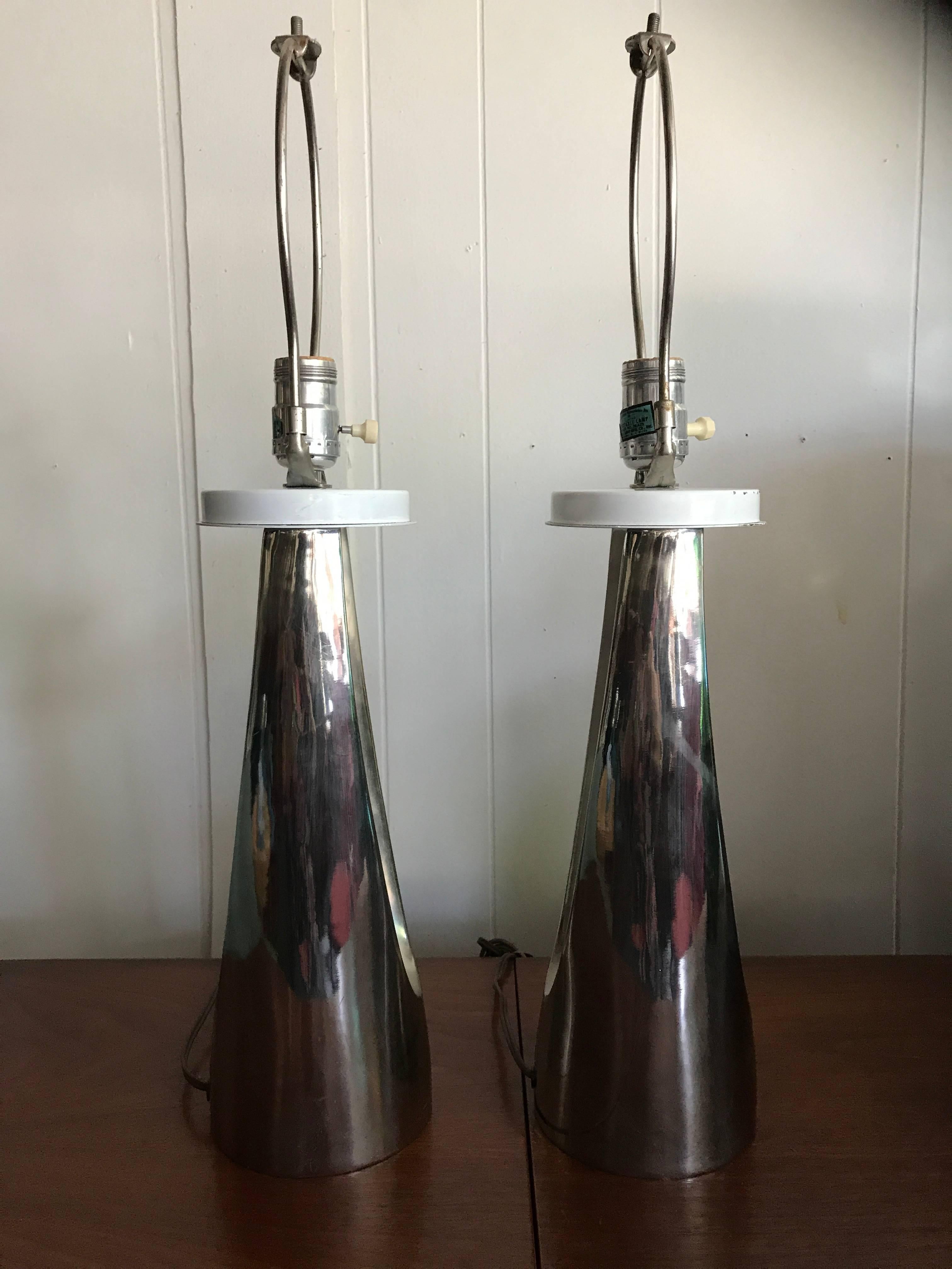 Gorgeous pair of chrome Laurel hairpin lamps. These lamps are on the smaller side measuring 23