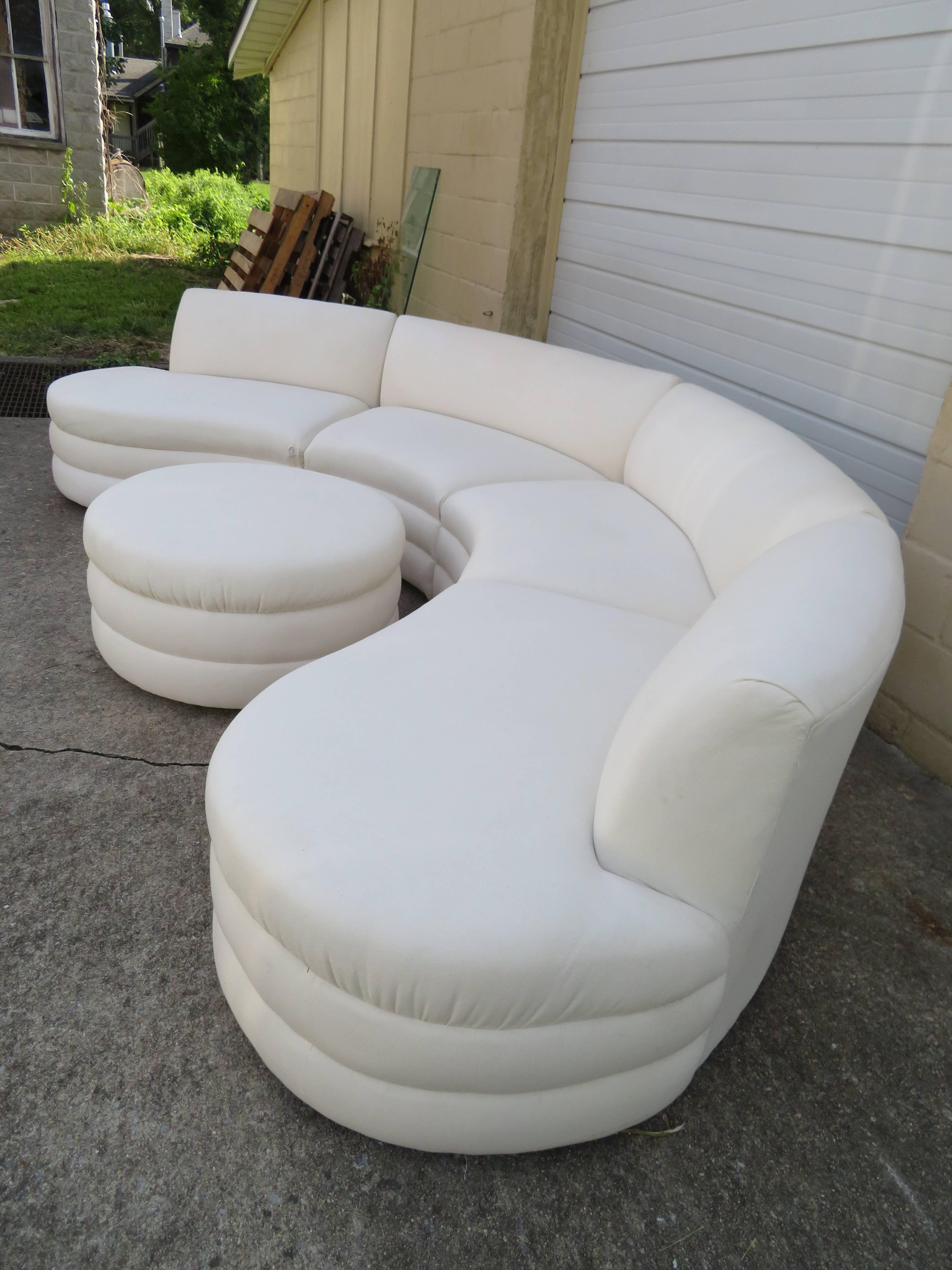 Fabulous five-piece curved sectional sofa attributed Directional with cool swivel ottoman. This sensational set will need to be reupholstered but that's what you designers are looking for any way-right? Just imagine this done in a swanky blue iced