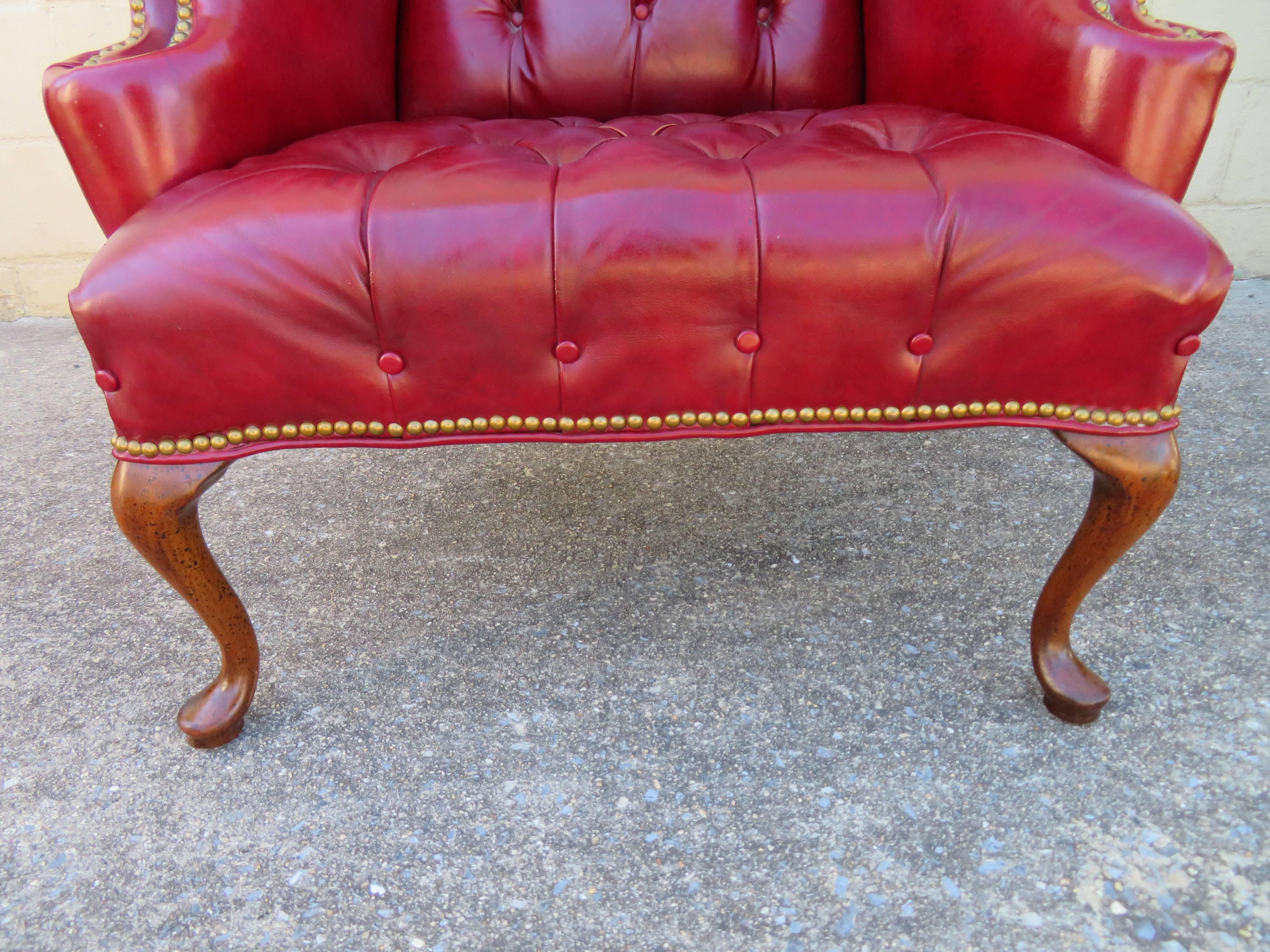 red leather tufted chair