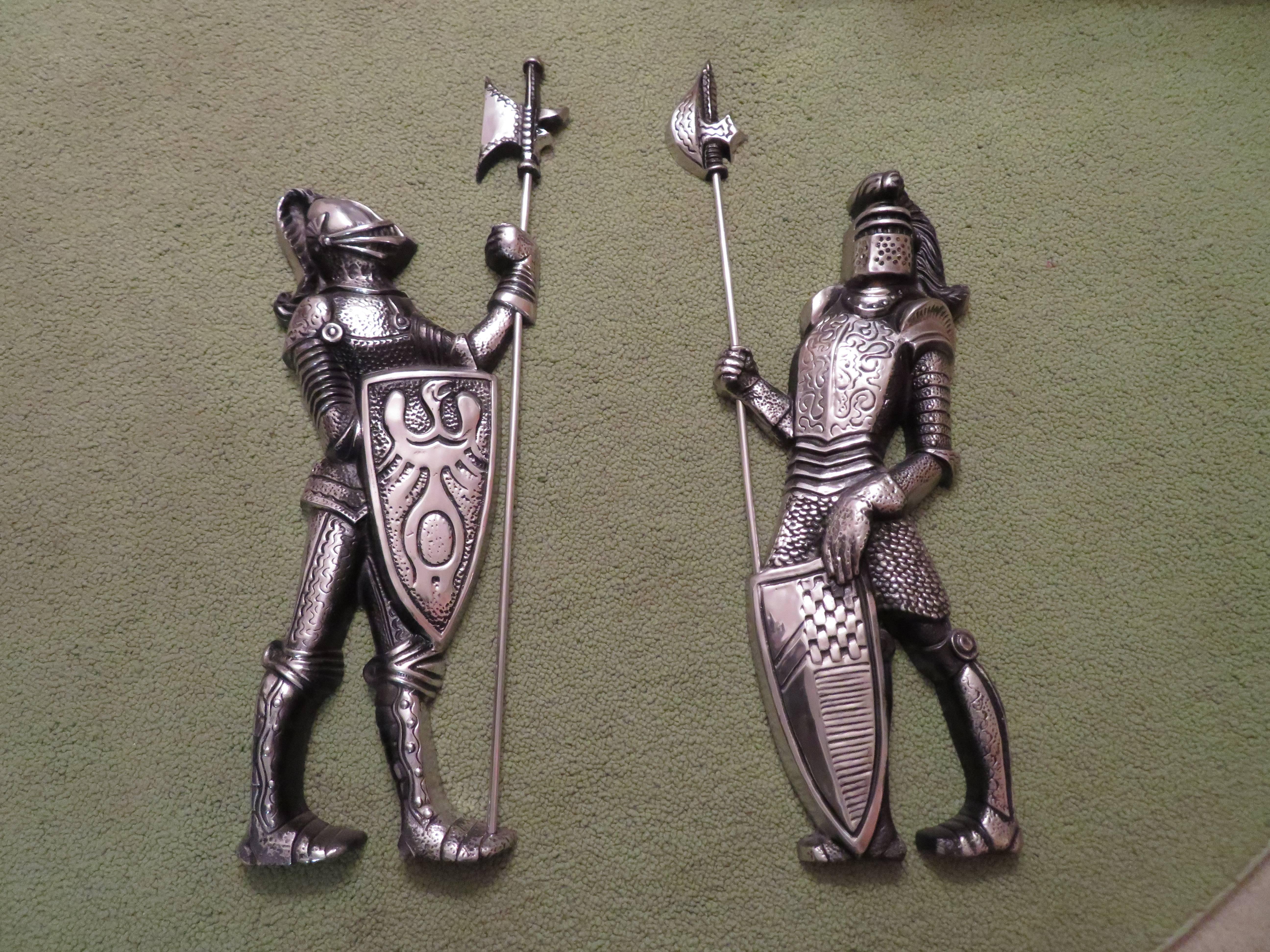 Medieval style lion coat of arms shield with two knights in armor from the midcentury. This vintage cast aluminum set is well crafted and is quite nice. The knights measure 35