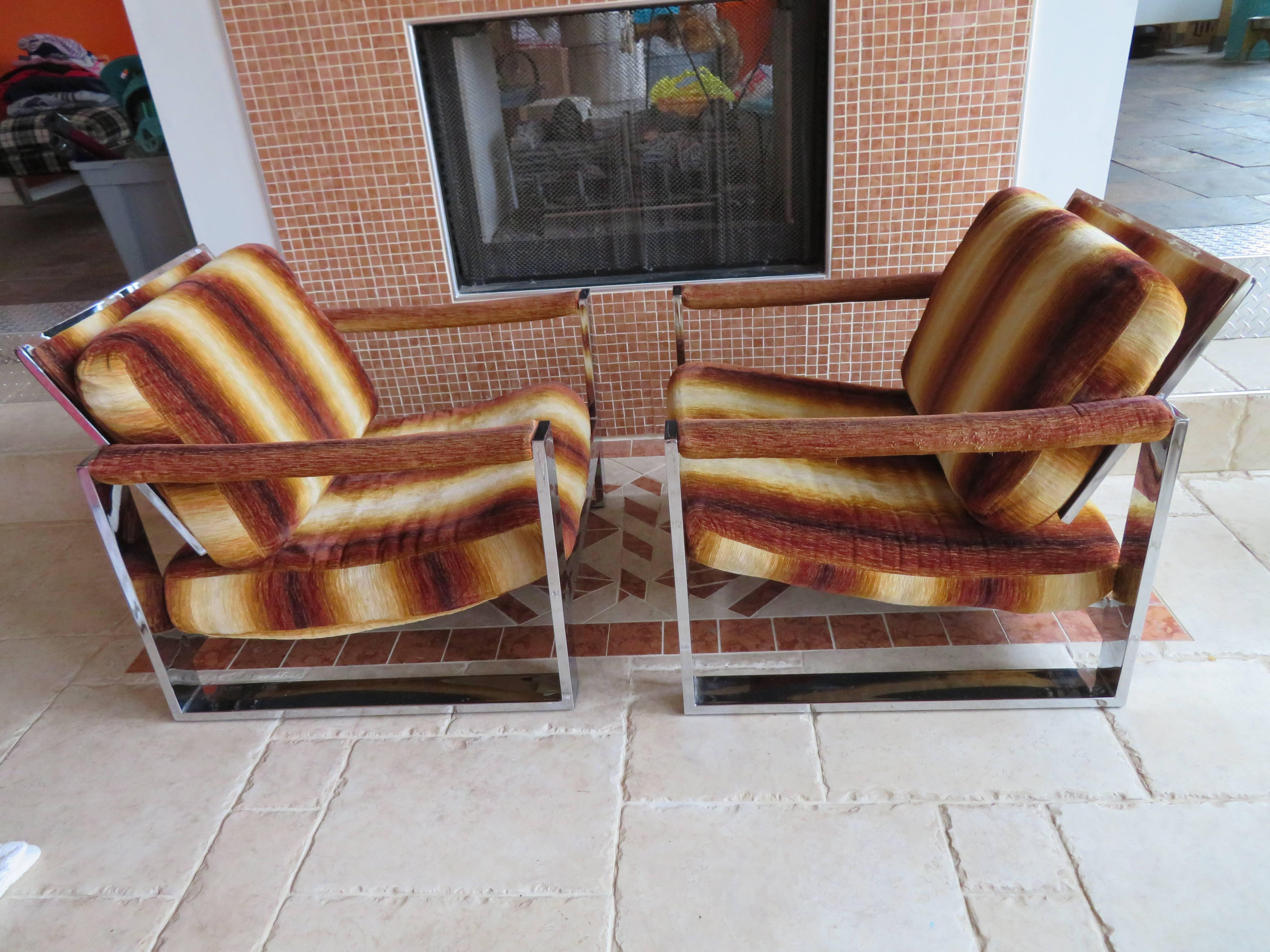 Super rare pair of wide chrome bar Milo Baughman for Thayer Coggin lounge chairs. We love the chunky chrome on this pair and it's in fabulous condition. The upholstery is dated and will need to be replaced.