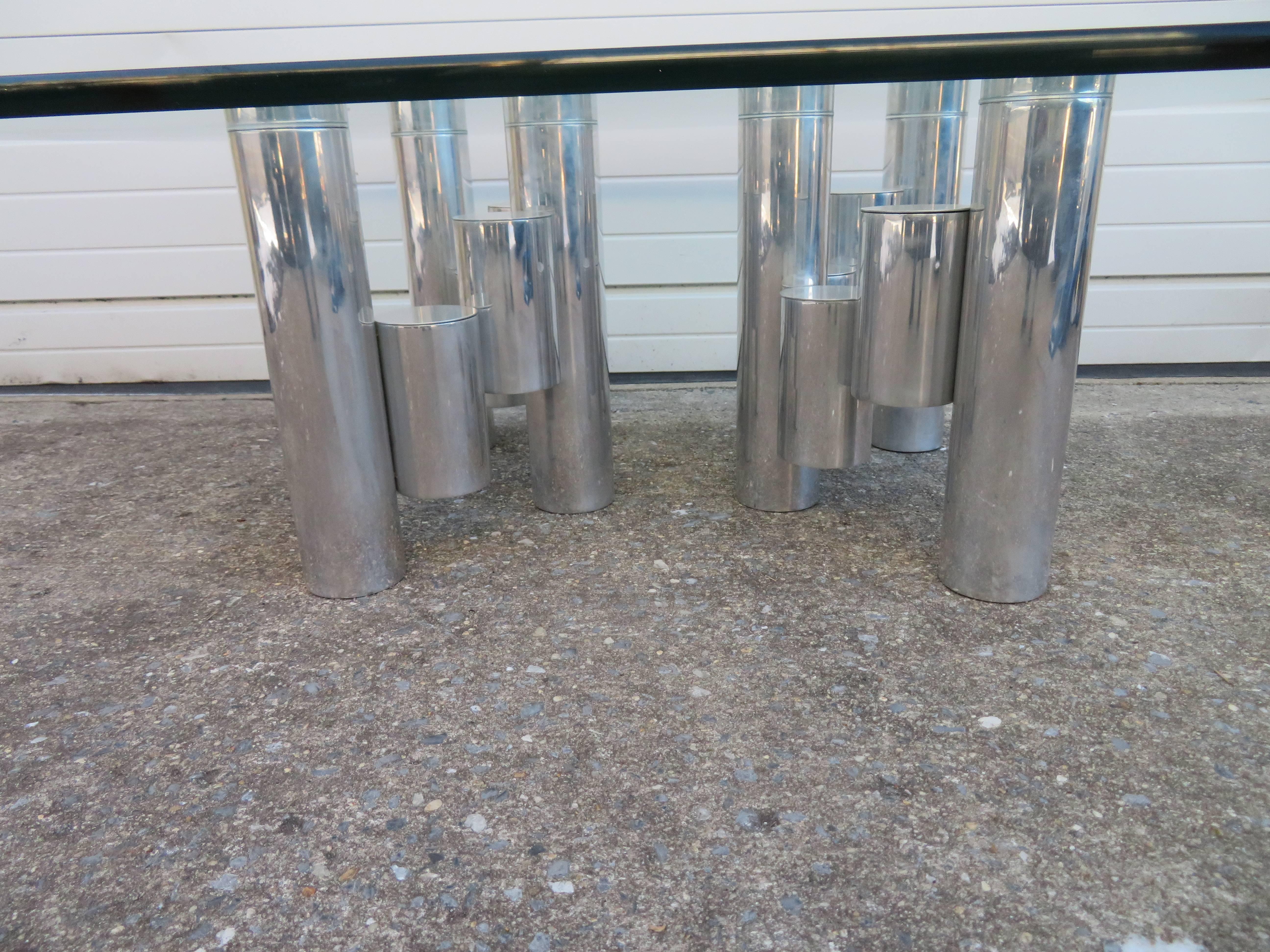 Stunning Paul Mayen for Habitat aluminum cylinder coffee table. The unusual bases measure 15