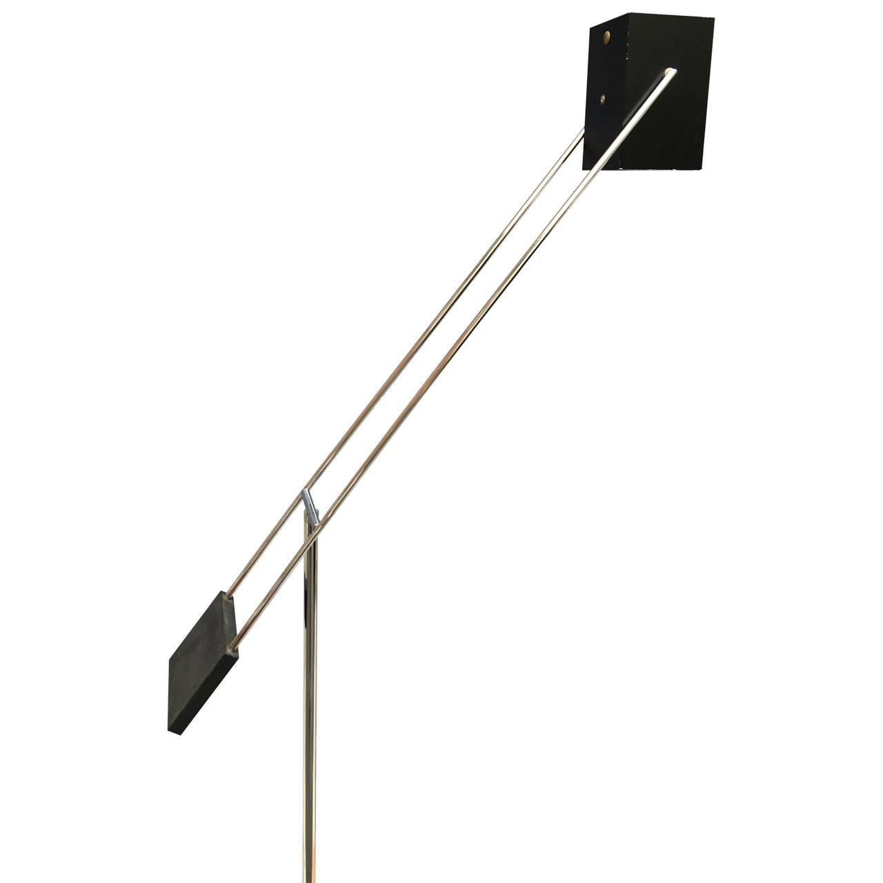Grand counterweight black shade and chrome skeleton base floor lamp in great working condition.

Height: Average: 66