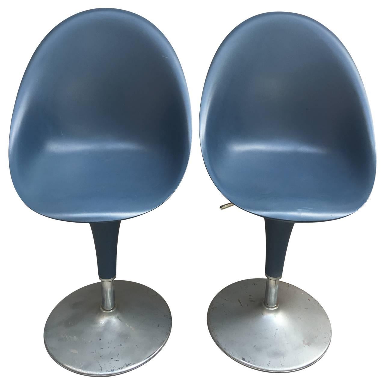 Two blue great looking Mid-Century chairs on aluminium base chairs. The seats adjusts up and down with the level handle under the seats.