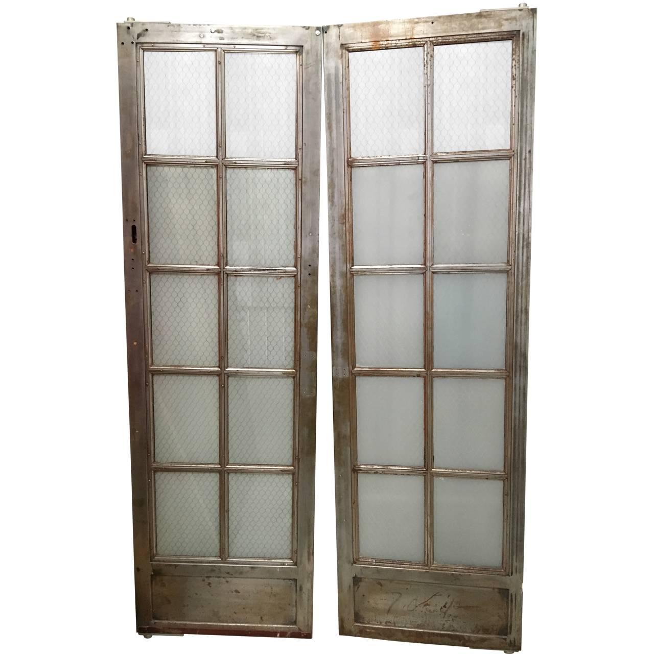 1 single elevator door is left or room divider or dressing screen
Glass panel size, inside, H 13 inches x W 9.5 inches