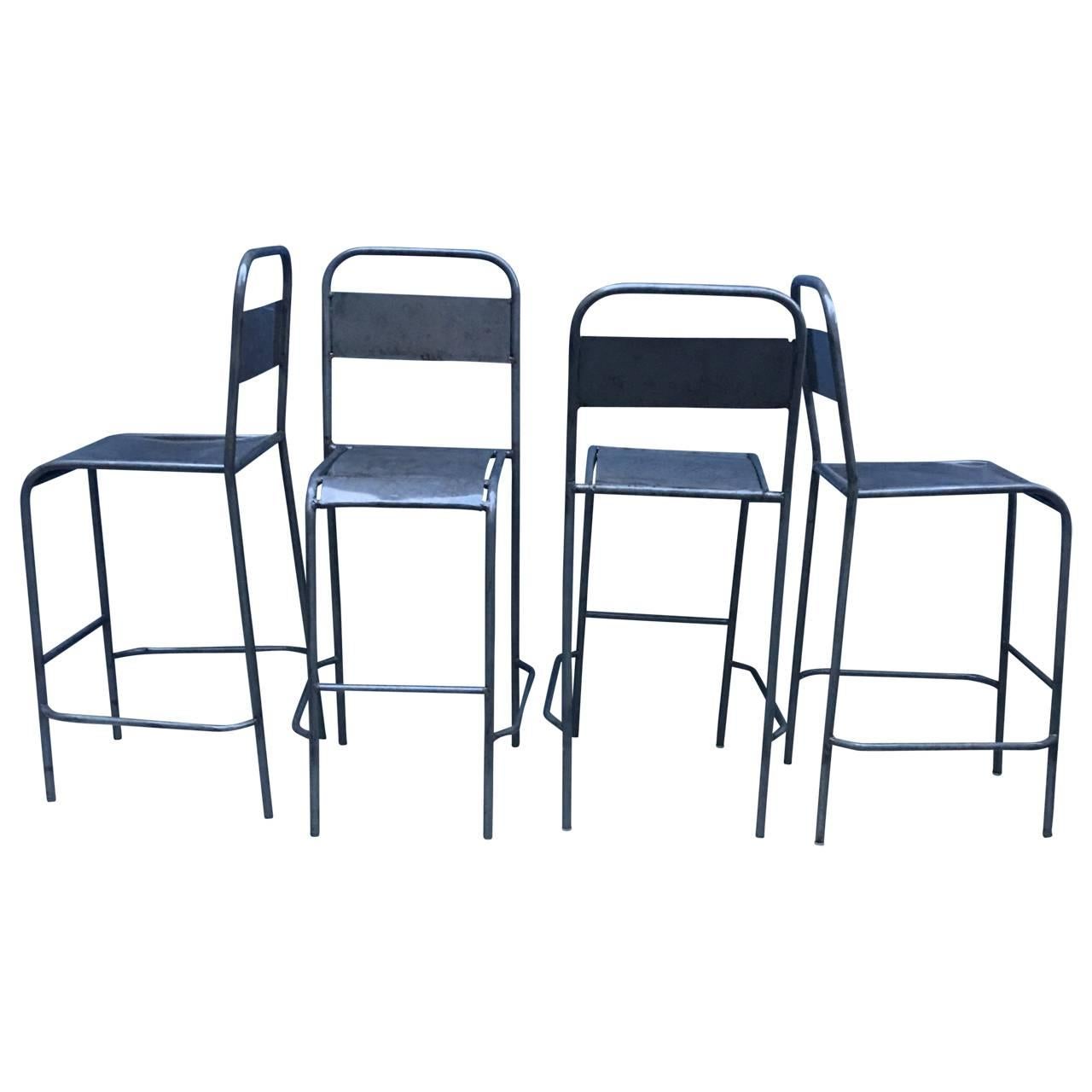 Set of 5 Industrial bar chairs.