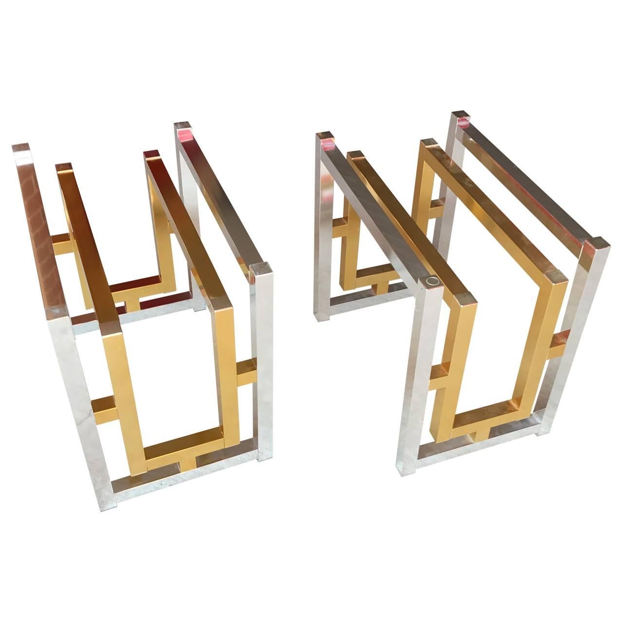Sharp looking pair of geometric chrome and brass side tables.
Tables without glass tops measures; 21.5 inches  x 14 inches
Bases can hold many sized and shapes, eg round, square or one large single piece of glass.