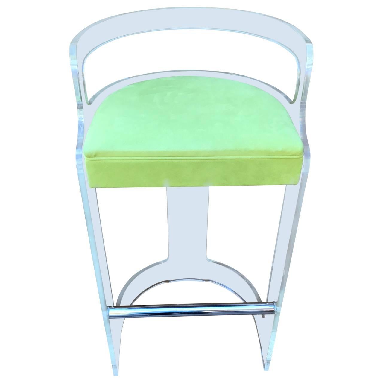 Key lime upholstered Lucite bar chair with chrome foot rest, manufactured by Hill MFG for Hollis Jones.