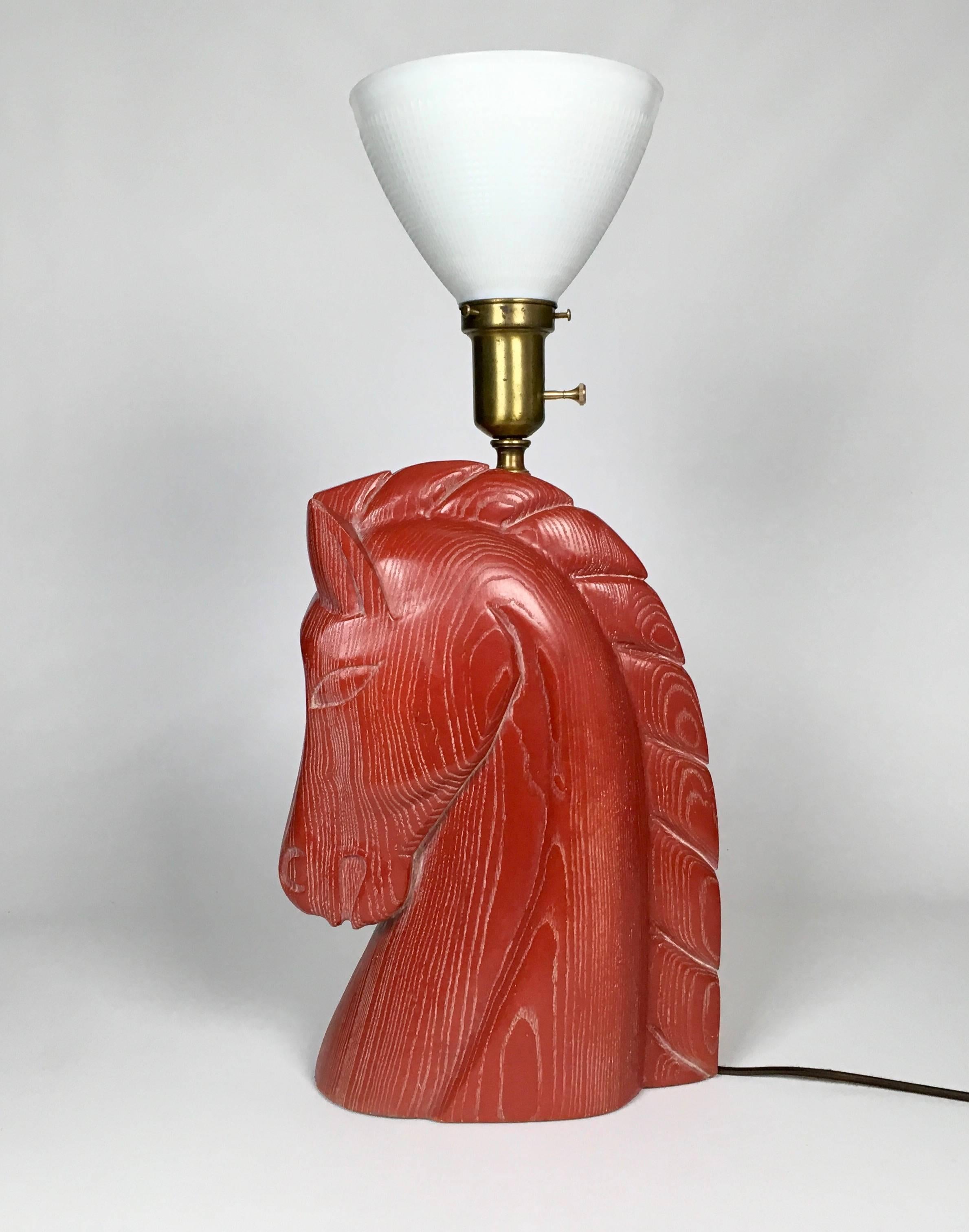 A Billy Haines Mid-Century red limed oak horse head lamp in excellent condition, circa 1950. Rewired, new wire and switch. Original red limed oak with original shade and finial. Measures: Shade 20 1/2