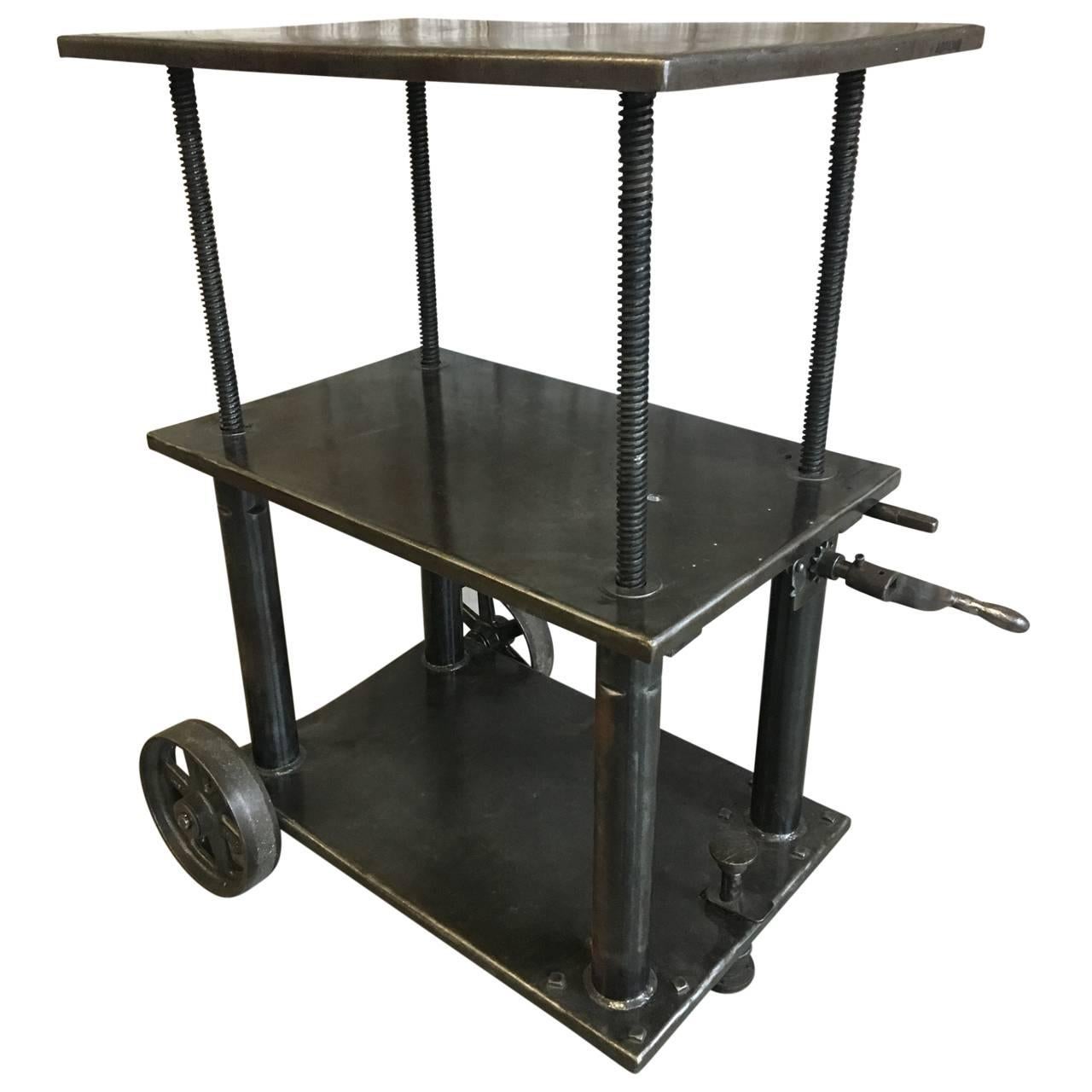 Industrial lift bar cart.
Highest setting 39 inches.
Lowest setting 26 inches.